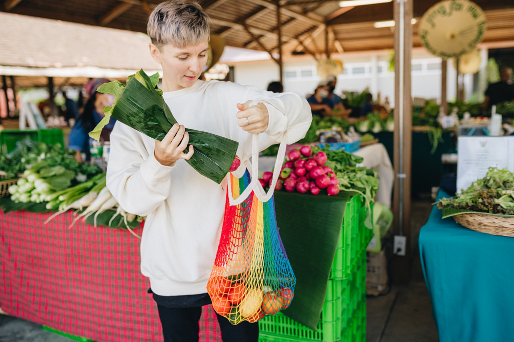 Woman buying vegetables at market by Natalie Zotova on 500px.com