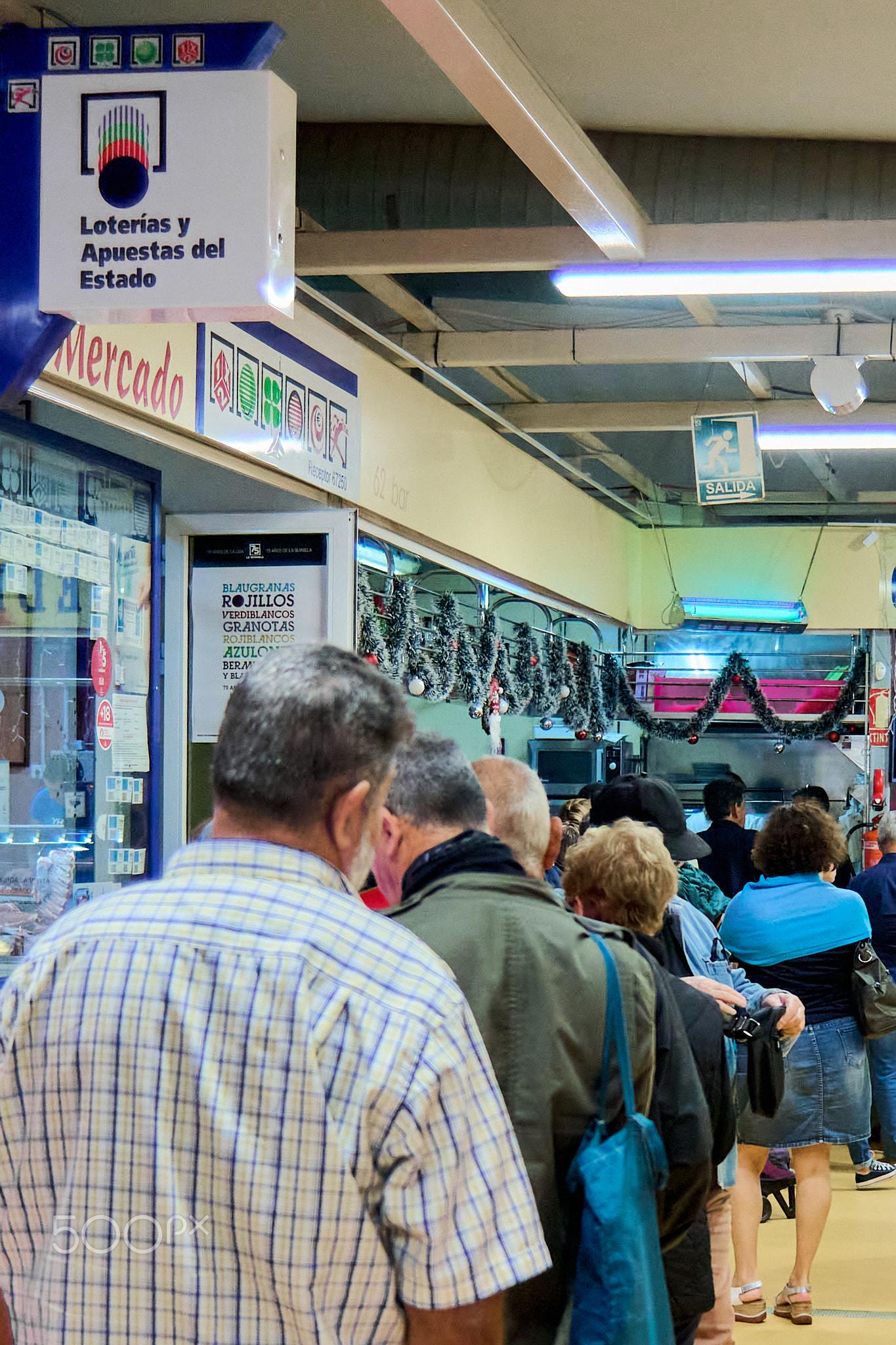 Tenerife, Spain - January 07, 2023: People queuing up to buy lottery