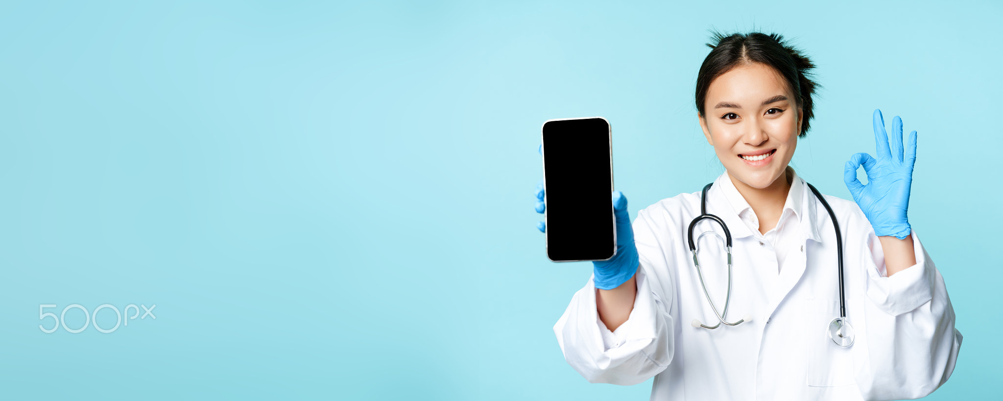 Web healthcare, online help concept. Confident asian female doctor or