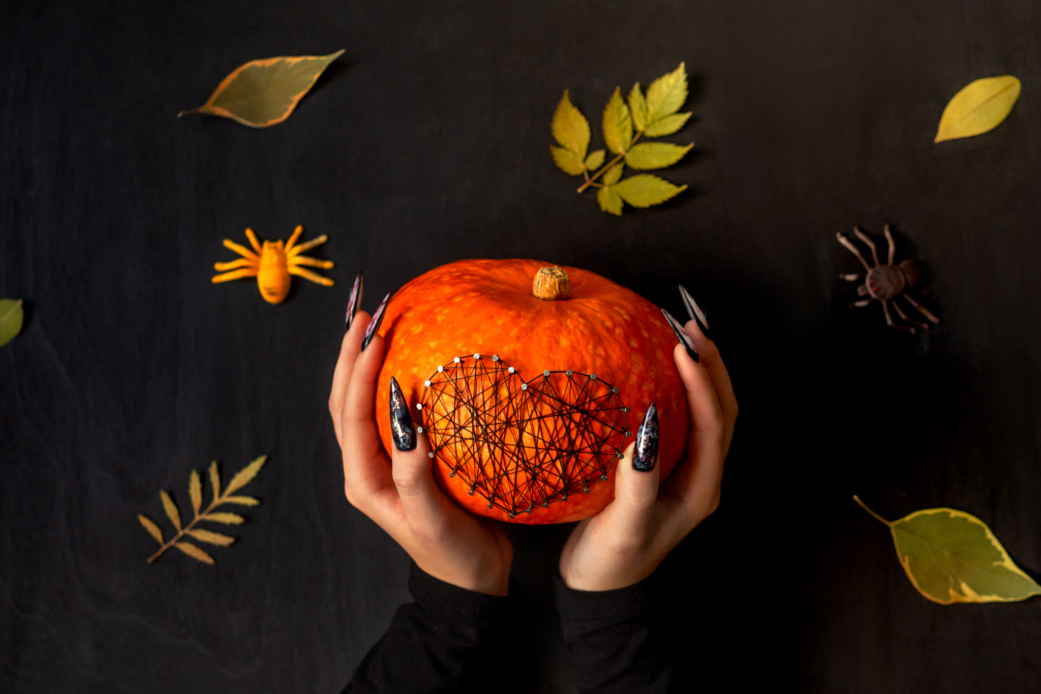 Halloween Nail Art Design, hands and decorations.