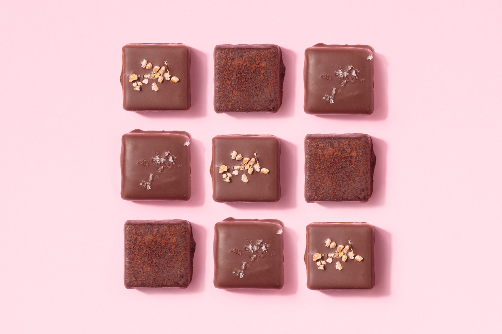 Handcrafted chocolate praline bonbons. Delicious dessert pattern