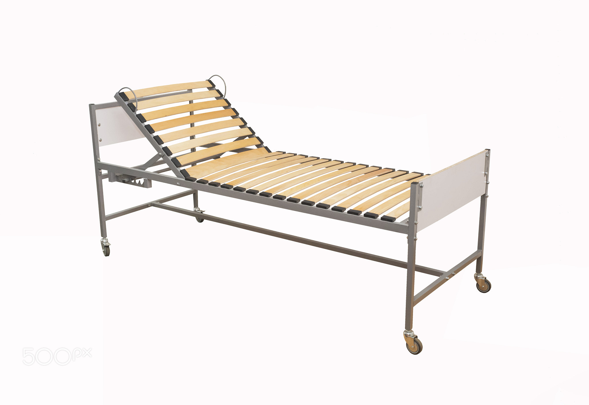 Bed for hospitals and nursing homes on a white background