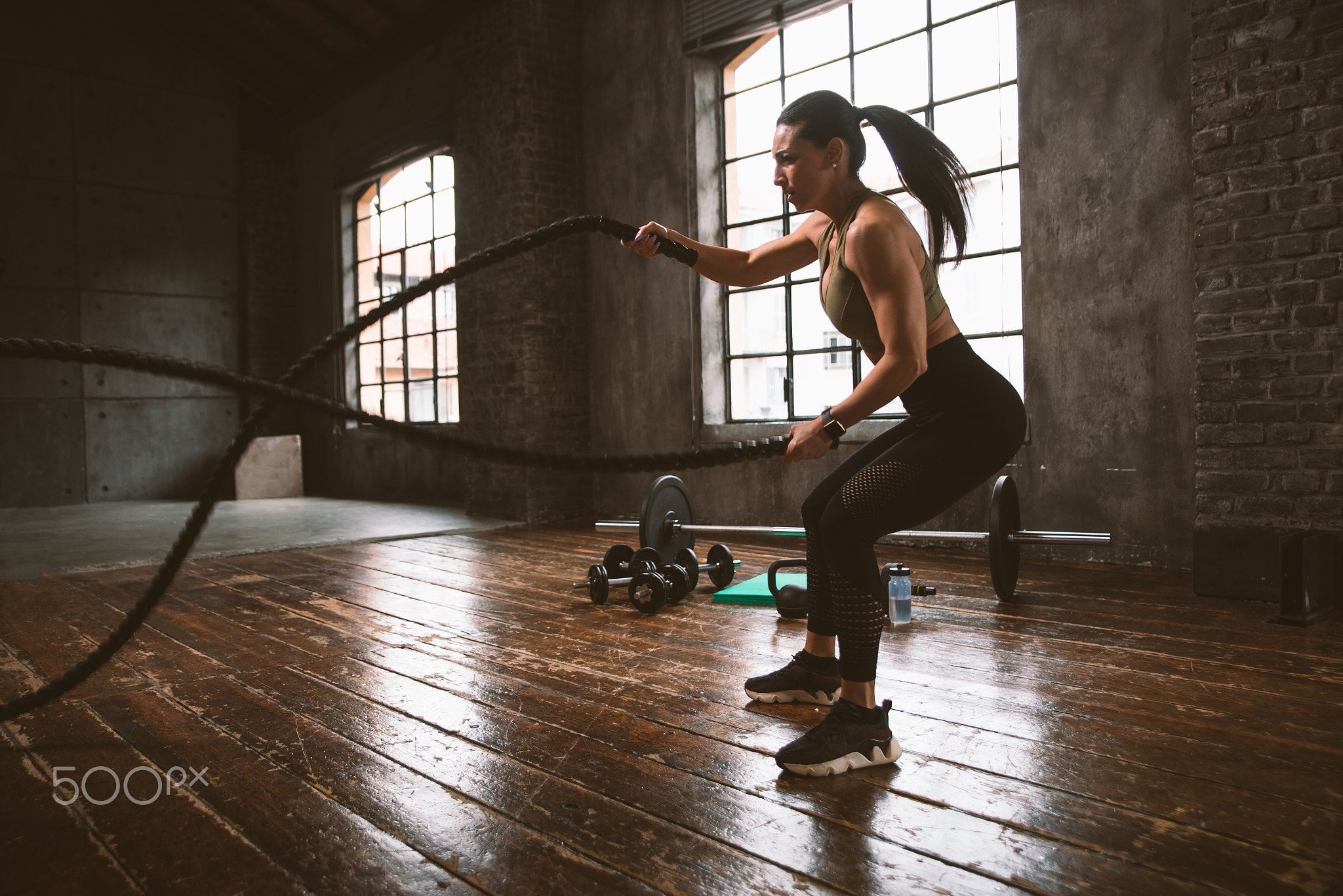 female bodybuilder training at the gym