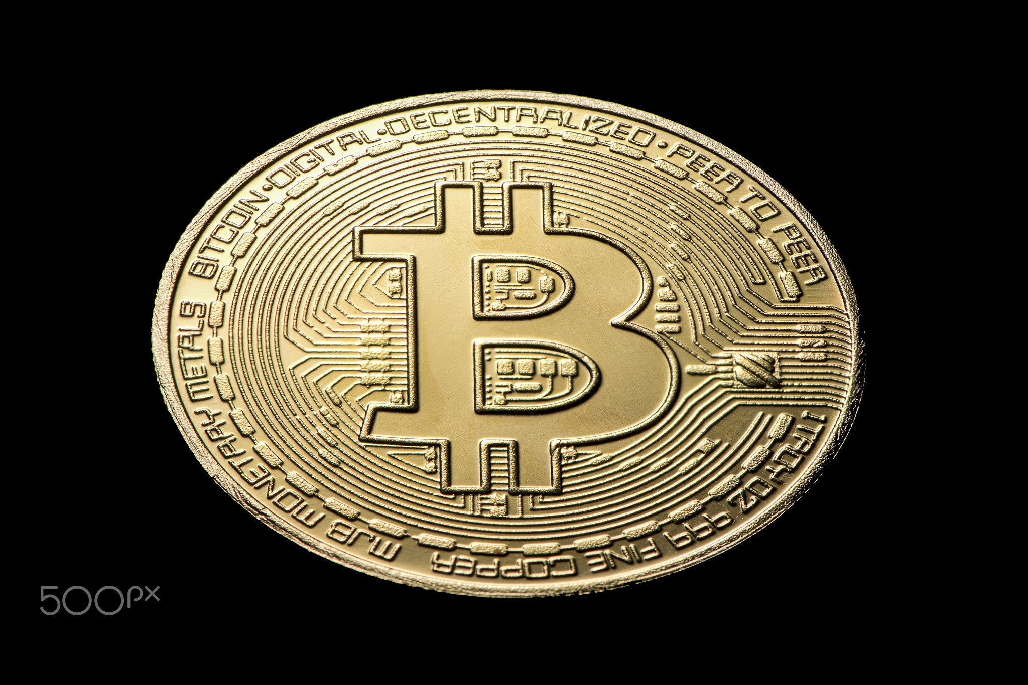 gold coin bitcoin on a black isolated background