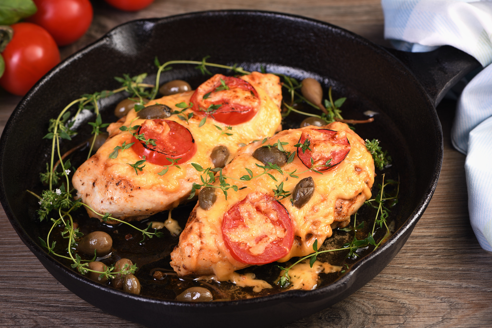 Chicken breast with cheese and tomatoes