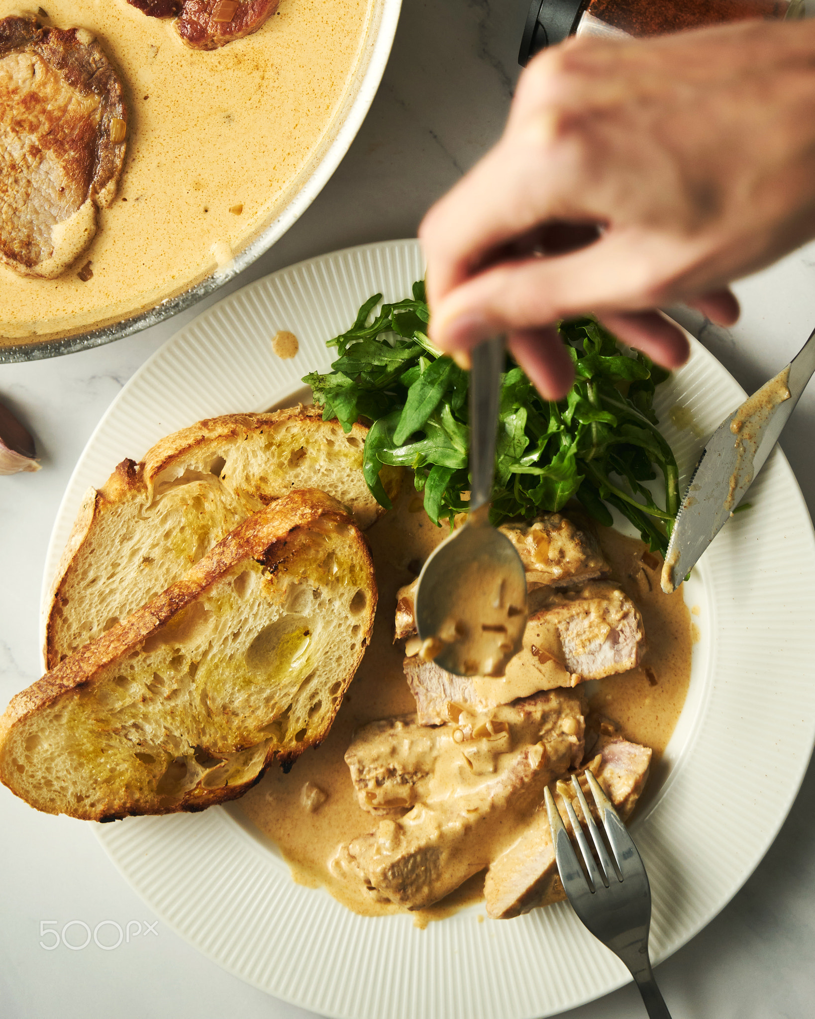 Pork paprikash with onion, butter and garlic. Sauce made from high fat