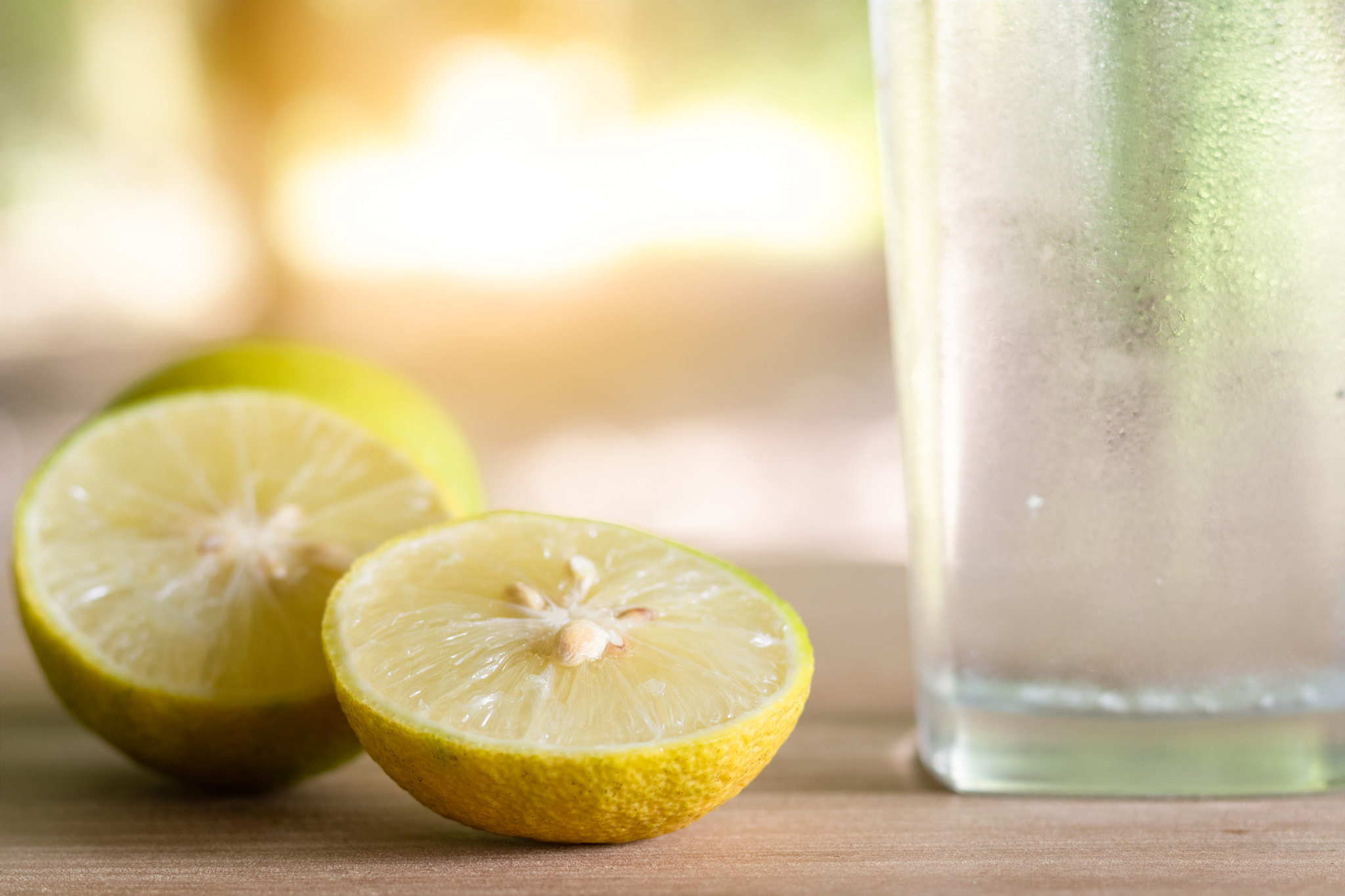 Fresh soda lemon in a Glass with Lemon Slices. Soda lemon juice.