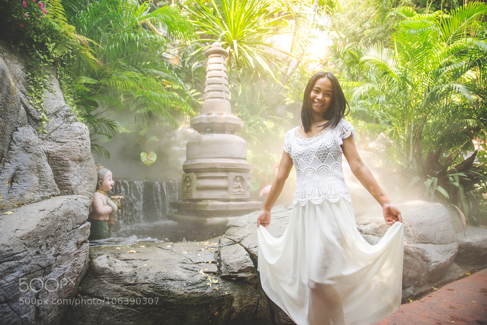 Nikon D610 sample photo. Woman praying at buddha photography