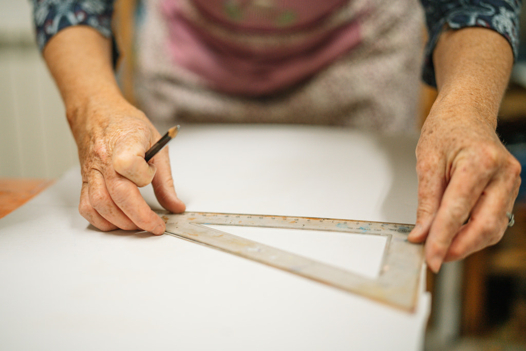 Midsection of woman making art product at table by Olha Dobosh on 500px.com