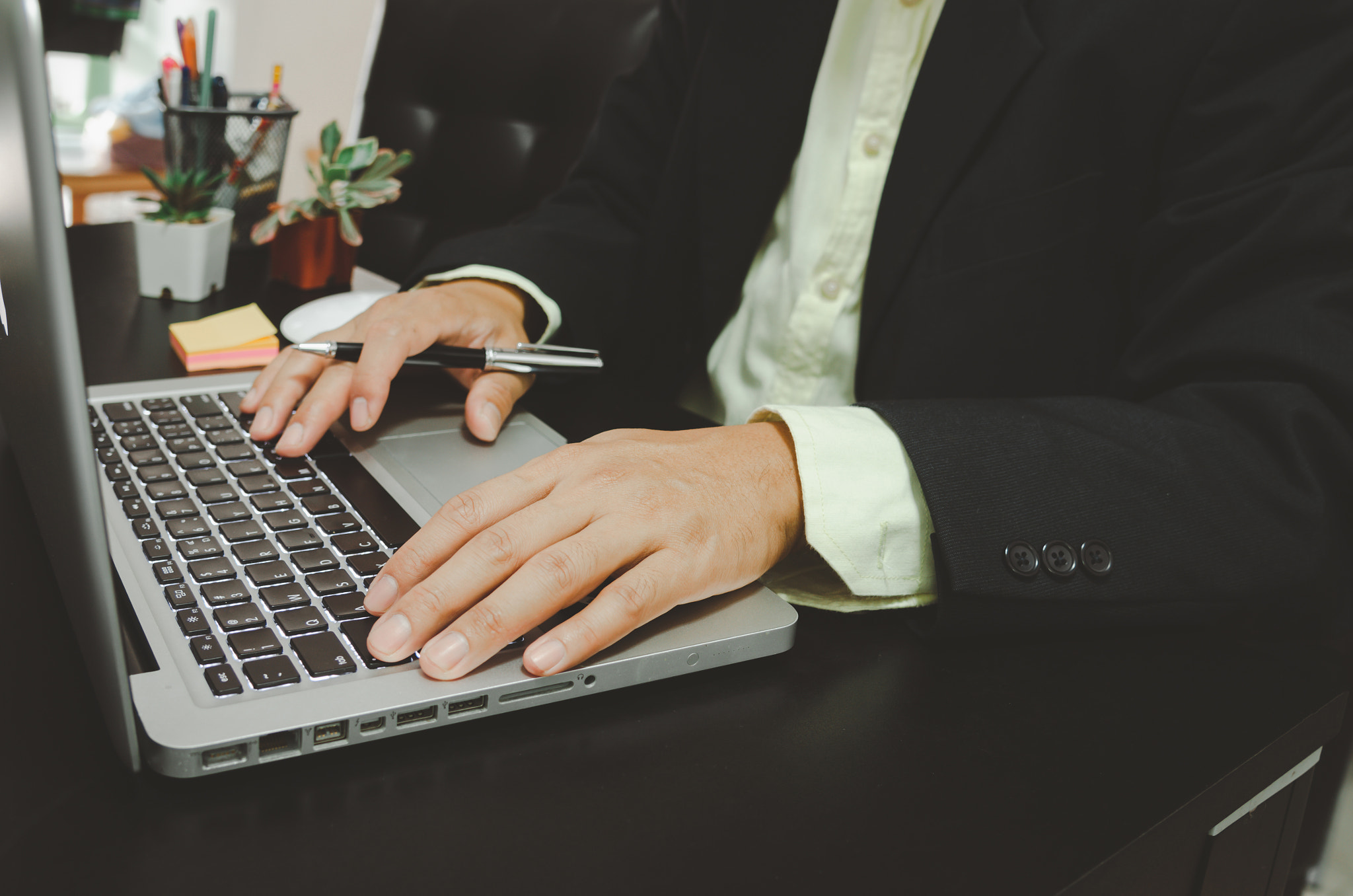 Businessman seacrh find information on Internet social media with computer laptop on desk. work for