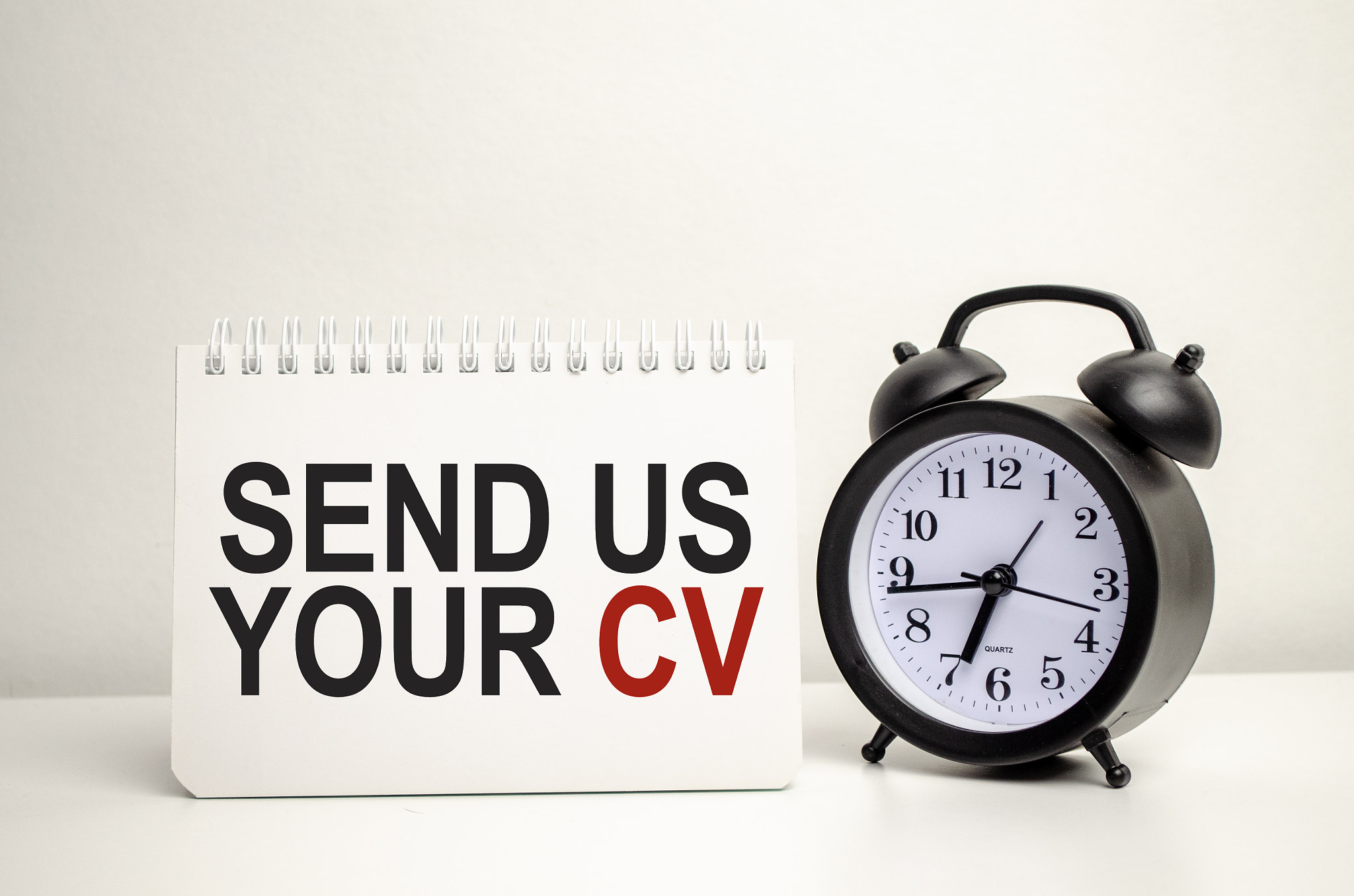 send us your cv words with calculator and clock with notebook