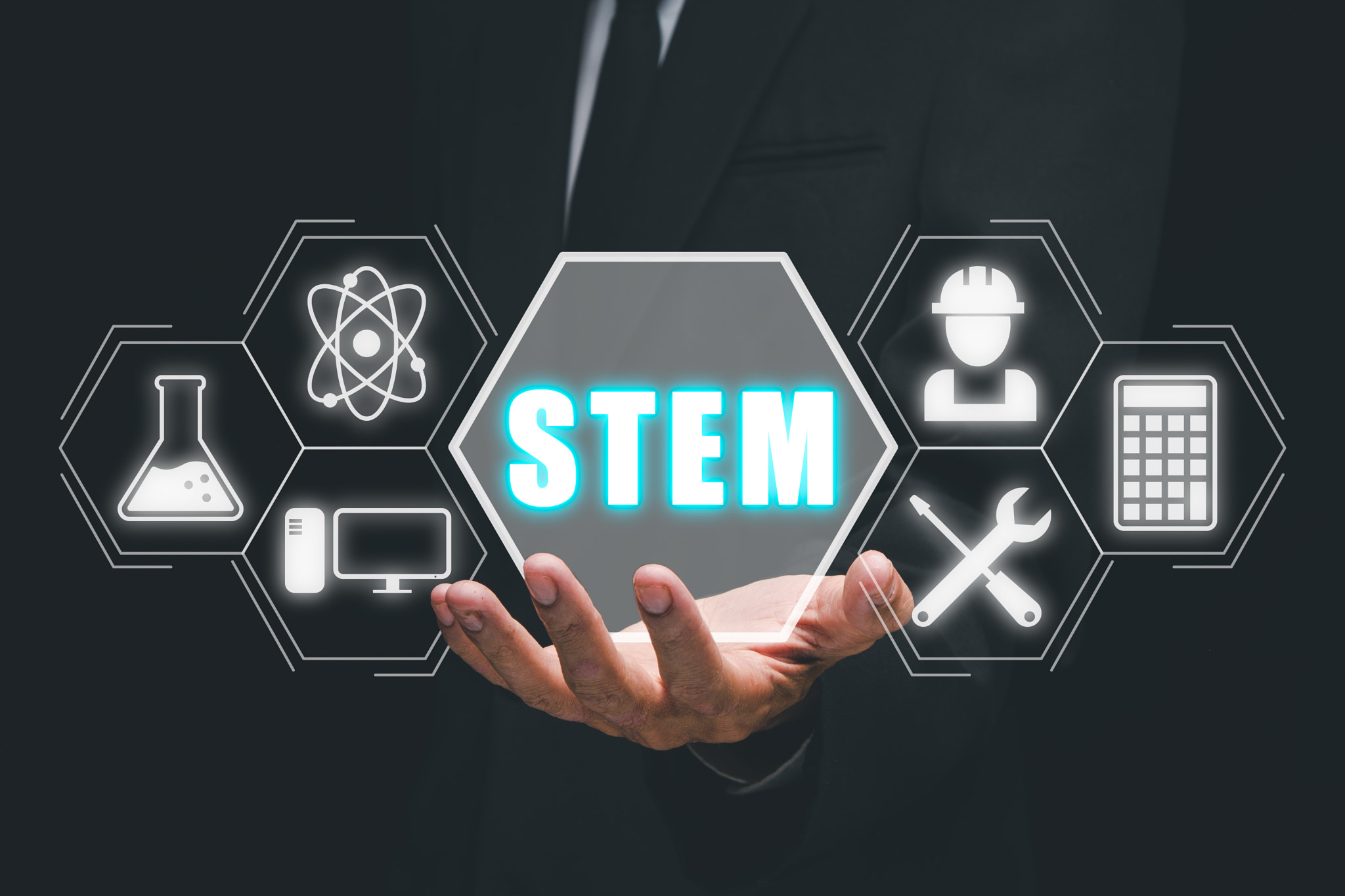 STEM concept, science, technology, engineering, mathematics, Businessman hand holding STEM icon on v