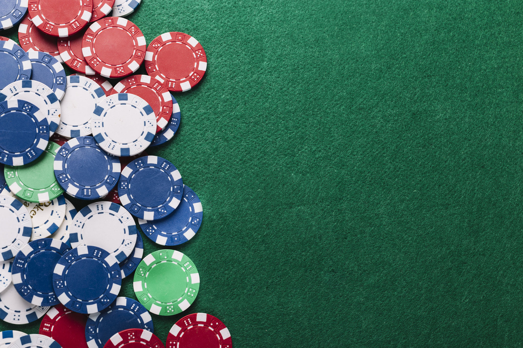 high angle view poker chips green table. High quality and resolution beautiful photo concept