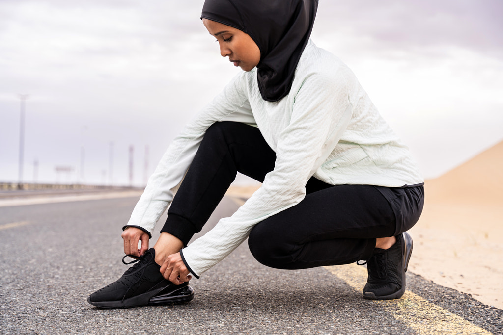 Beautiful arab sportive woman wearing hijab training outdoors  by Fabio Formaggio on 500px.com