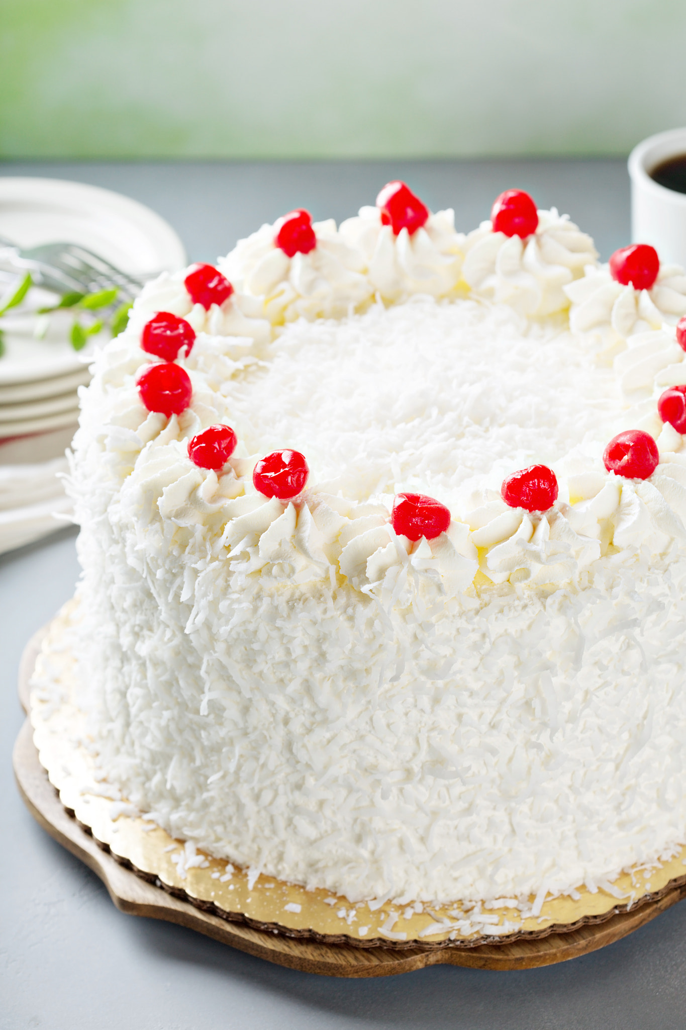 Coconut cake with maraschino cherries