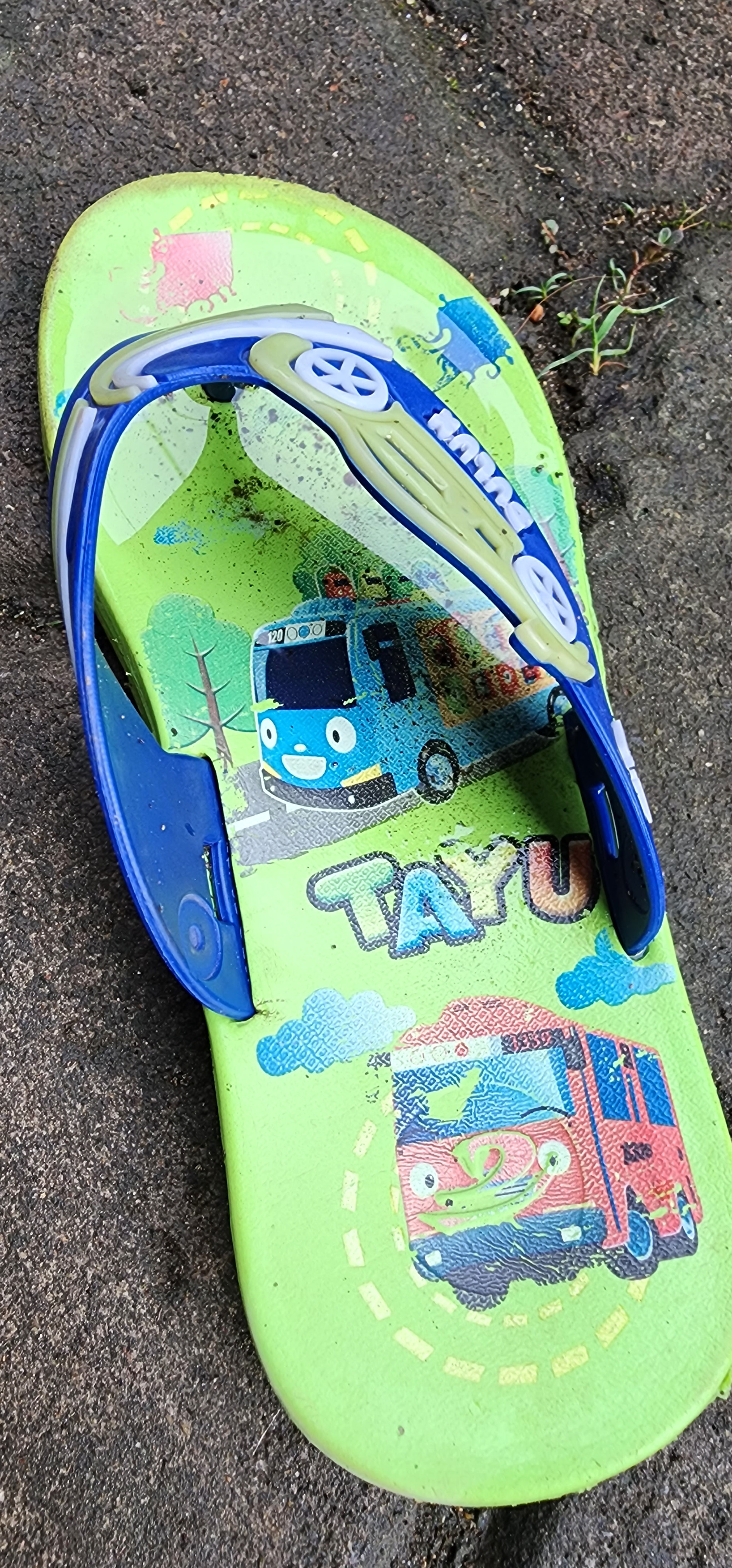 water puddle on fake tayo sandal