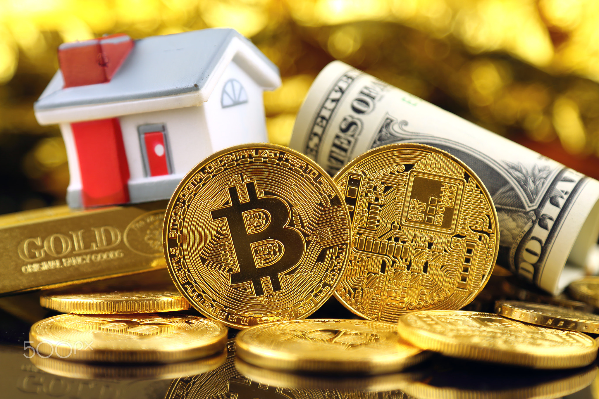 Conceptual image for investors in cryptocurrency (new virtual money), gold, real estate and dollars.