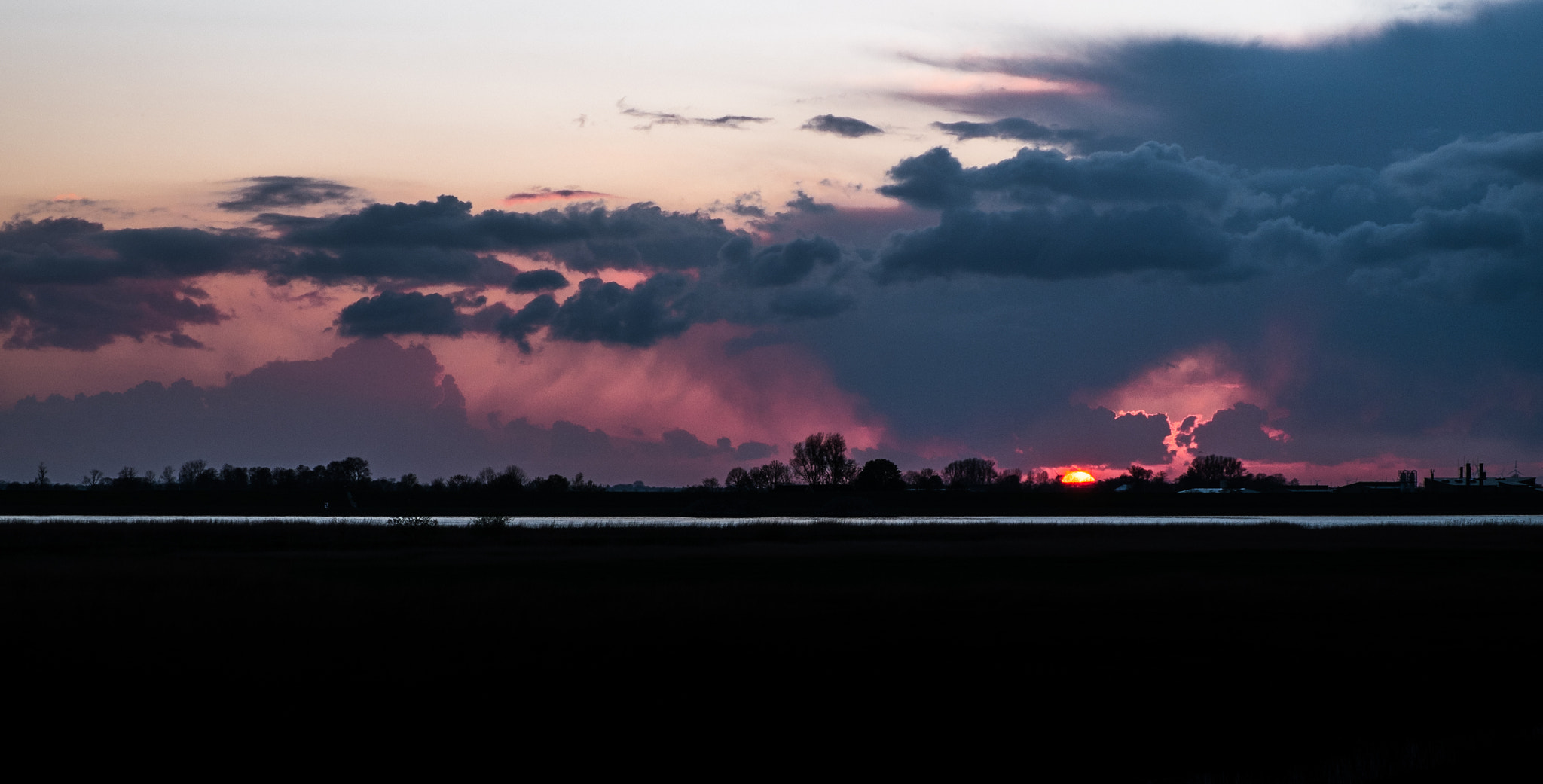 Sonnenuntergang an der Ems Ostfriesland