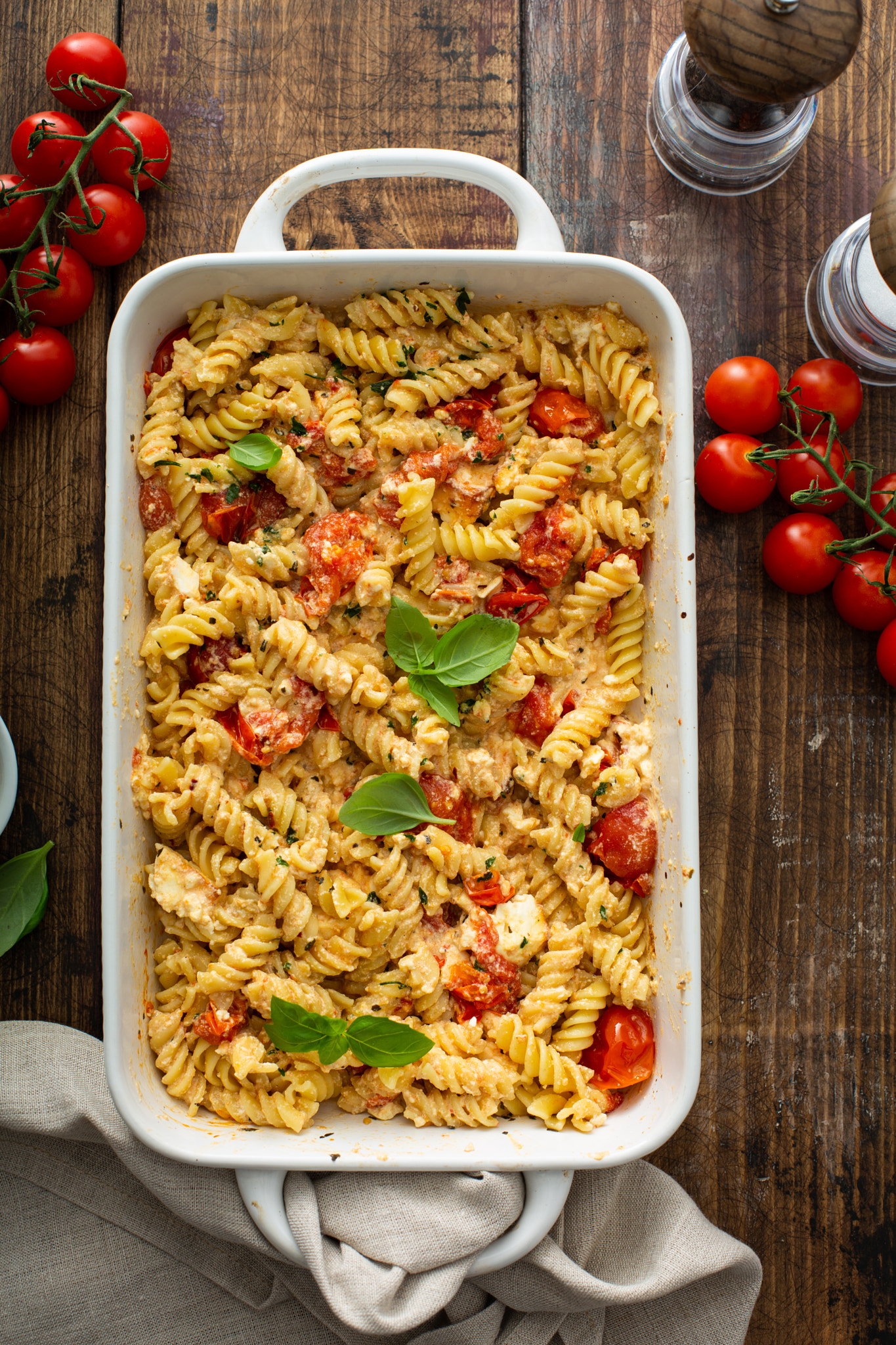 Baked feta pasta with cherry tomatoes and herbs