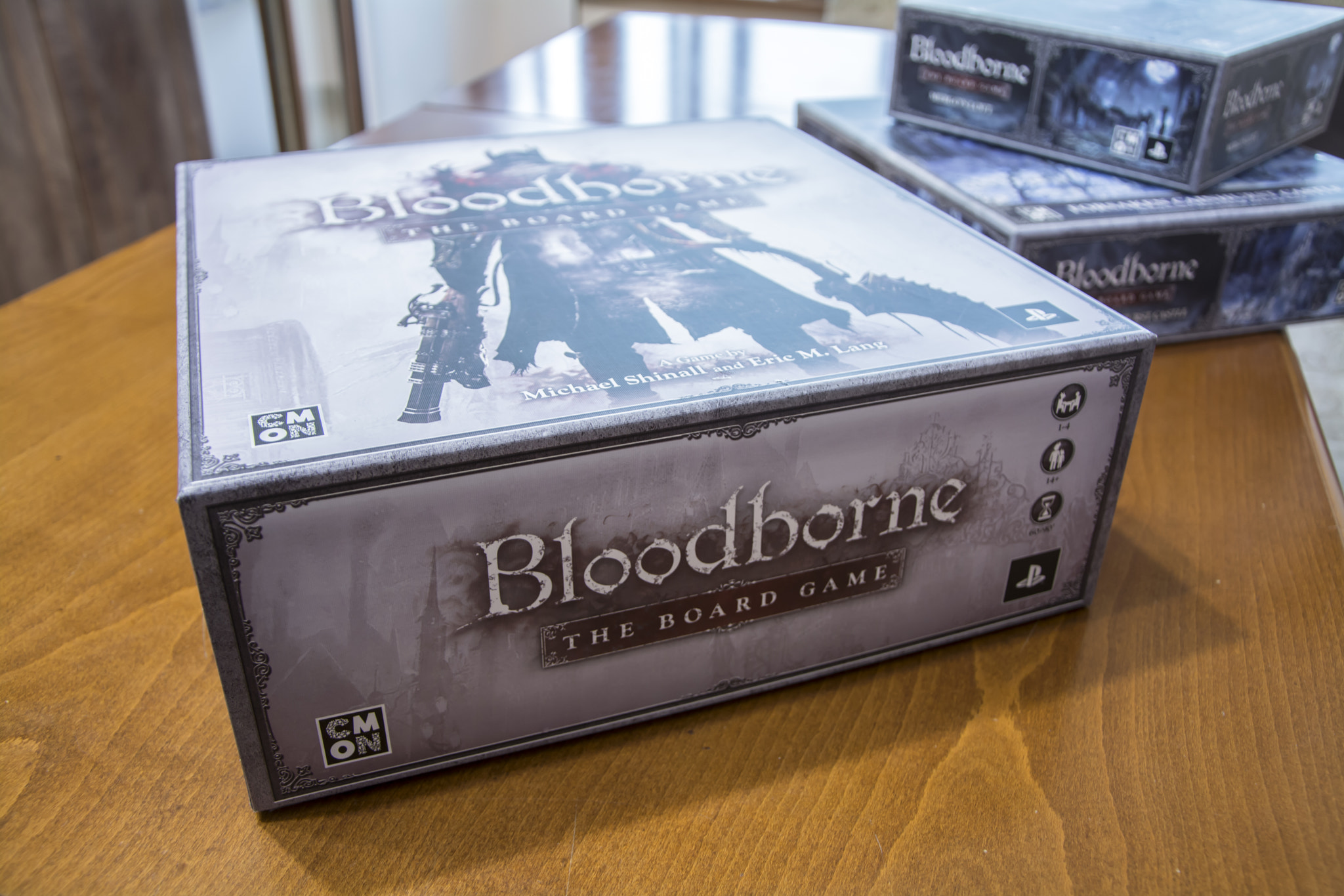 A box of the popular board game Bloodborne on a table