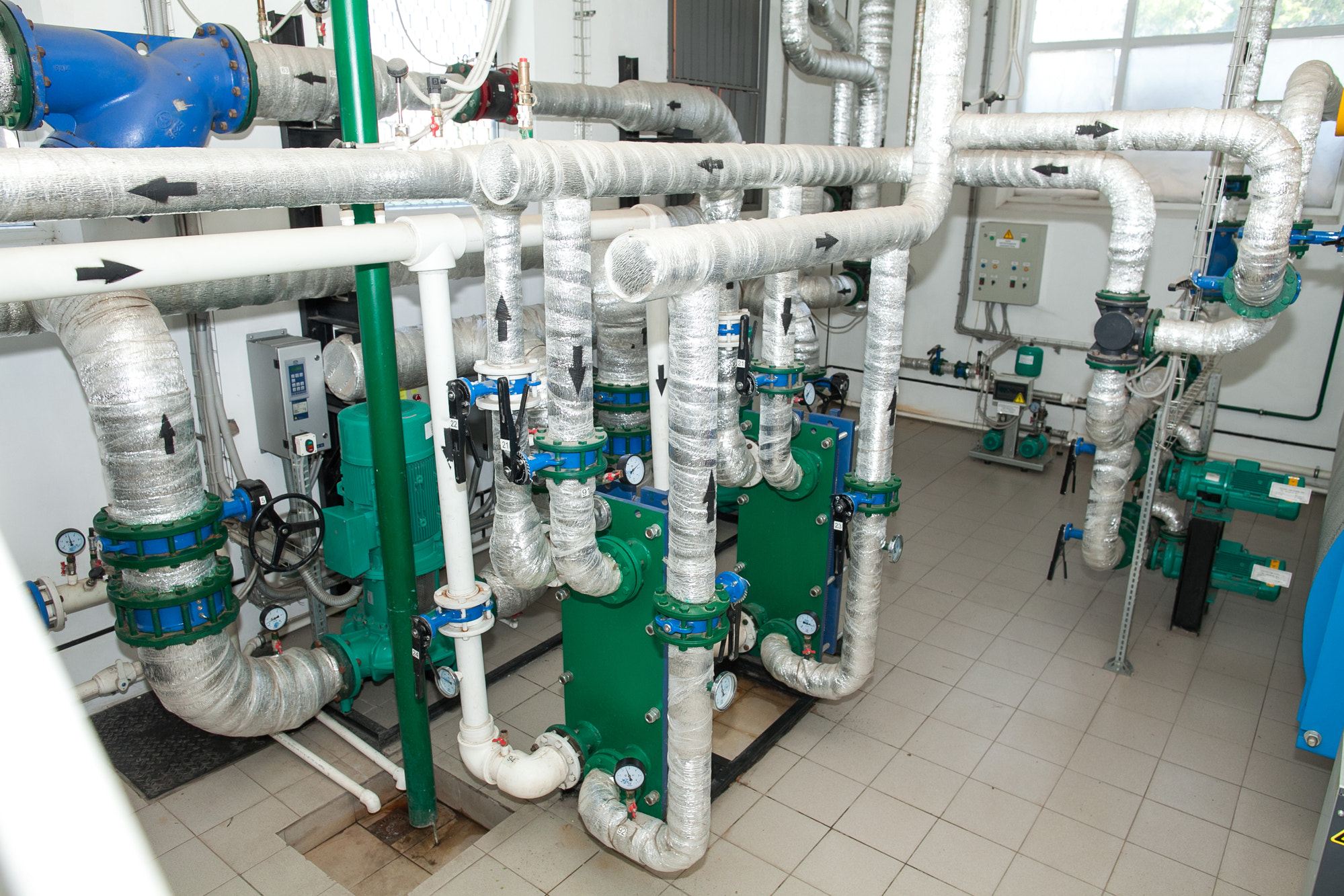 Pipes in a boiler room. Isolation of pipes. Water heating. Power supply. Water supply. Modern boiler
