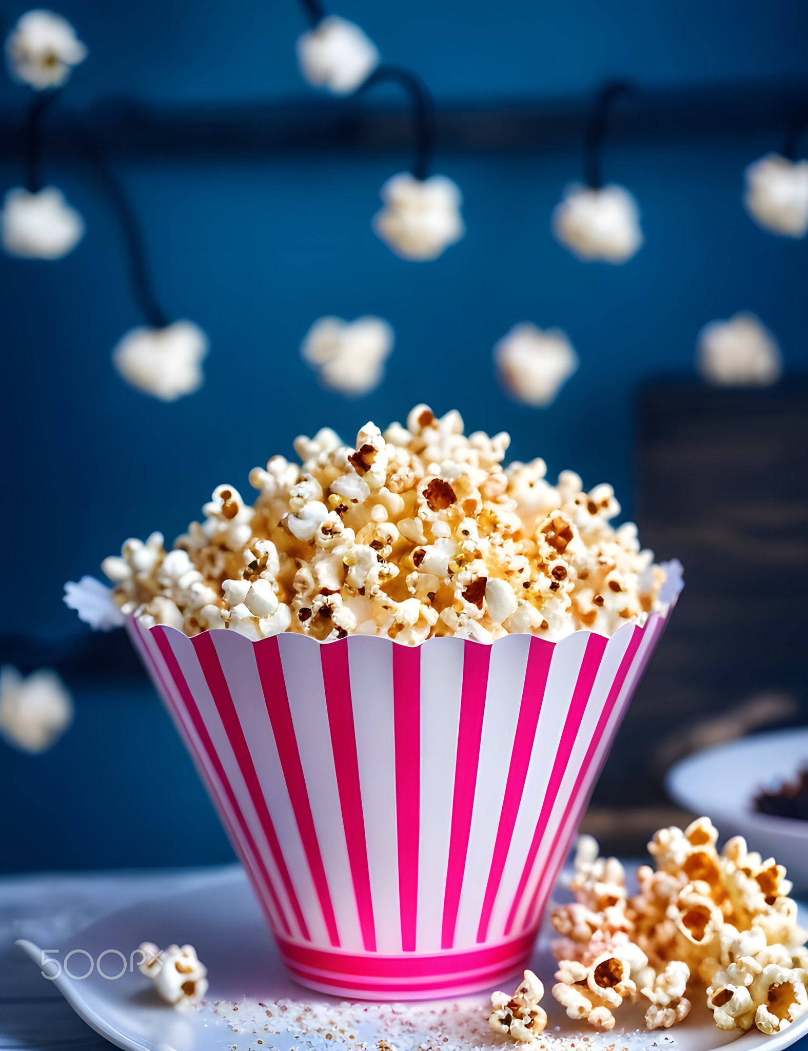 photography picture of popcorn in movie time.