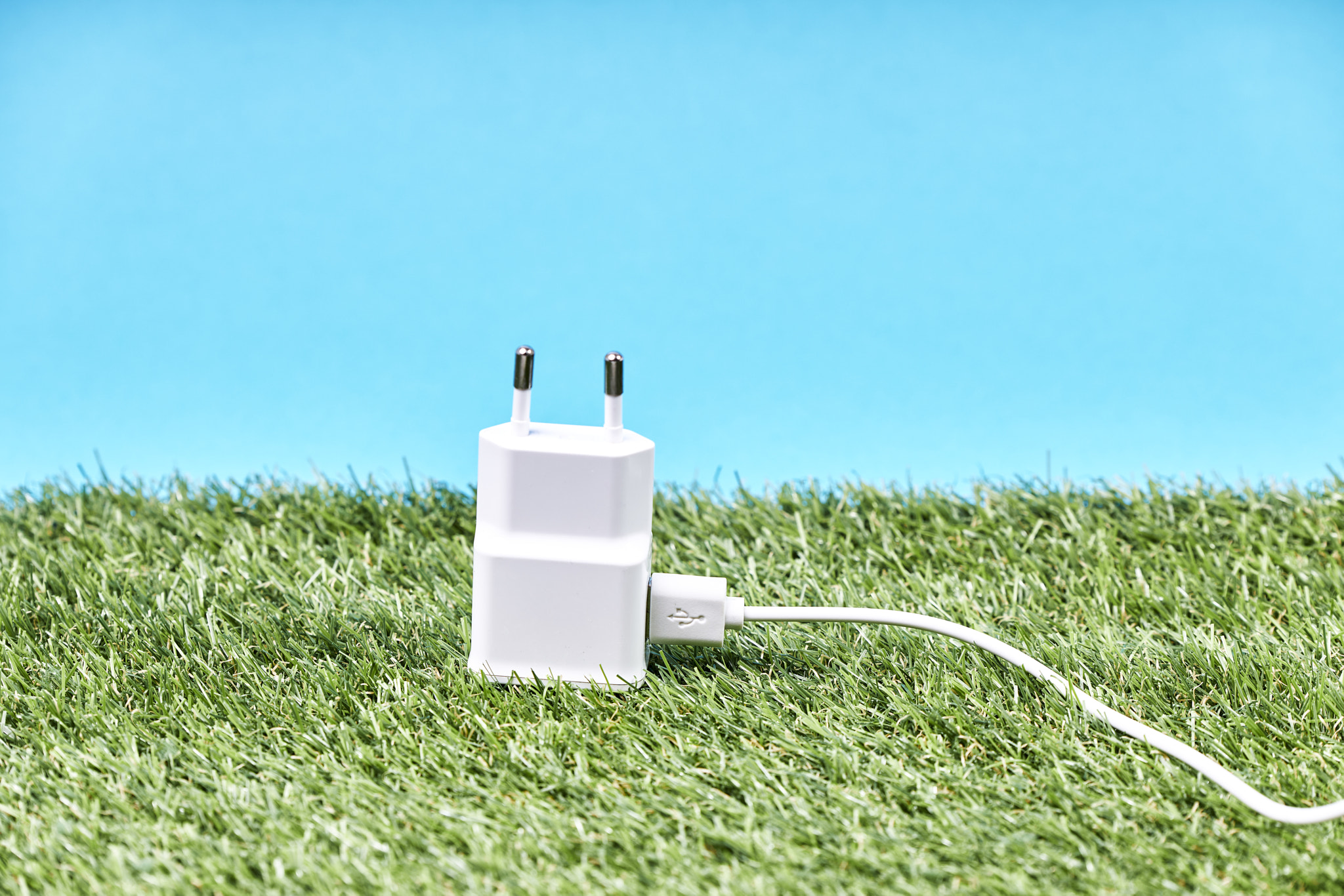 Loader on a field of green grass