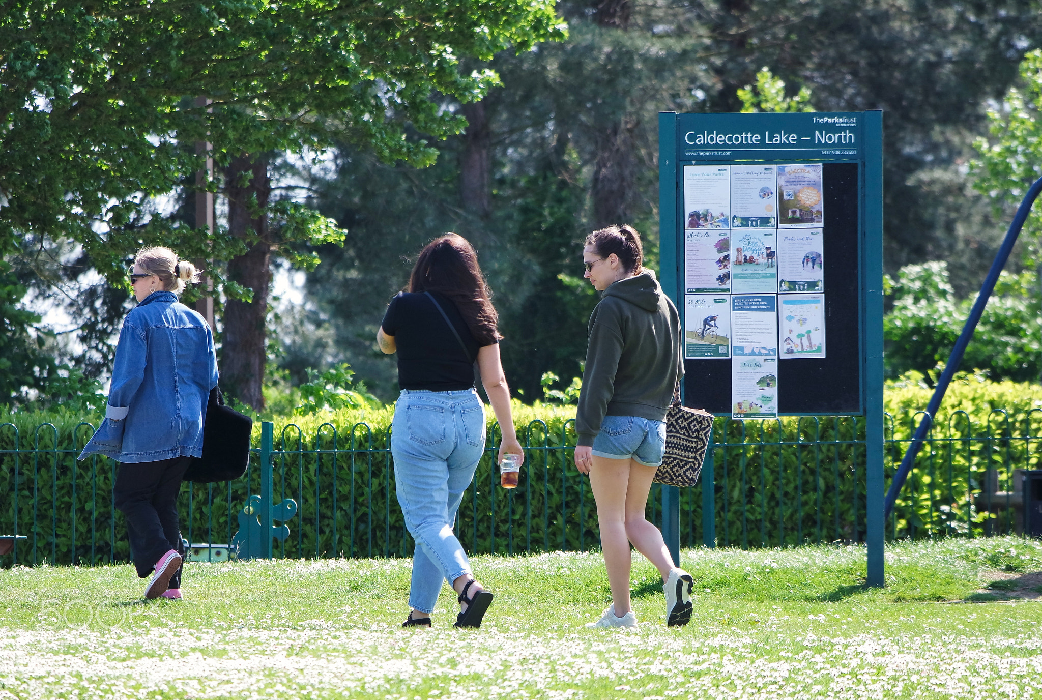 People at Caldecotte Lake of Milton Keynes to Enjoy the Weekend Sunday Holiday Families.