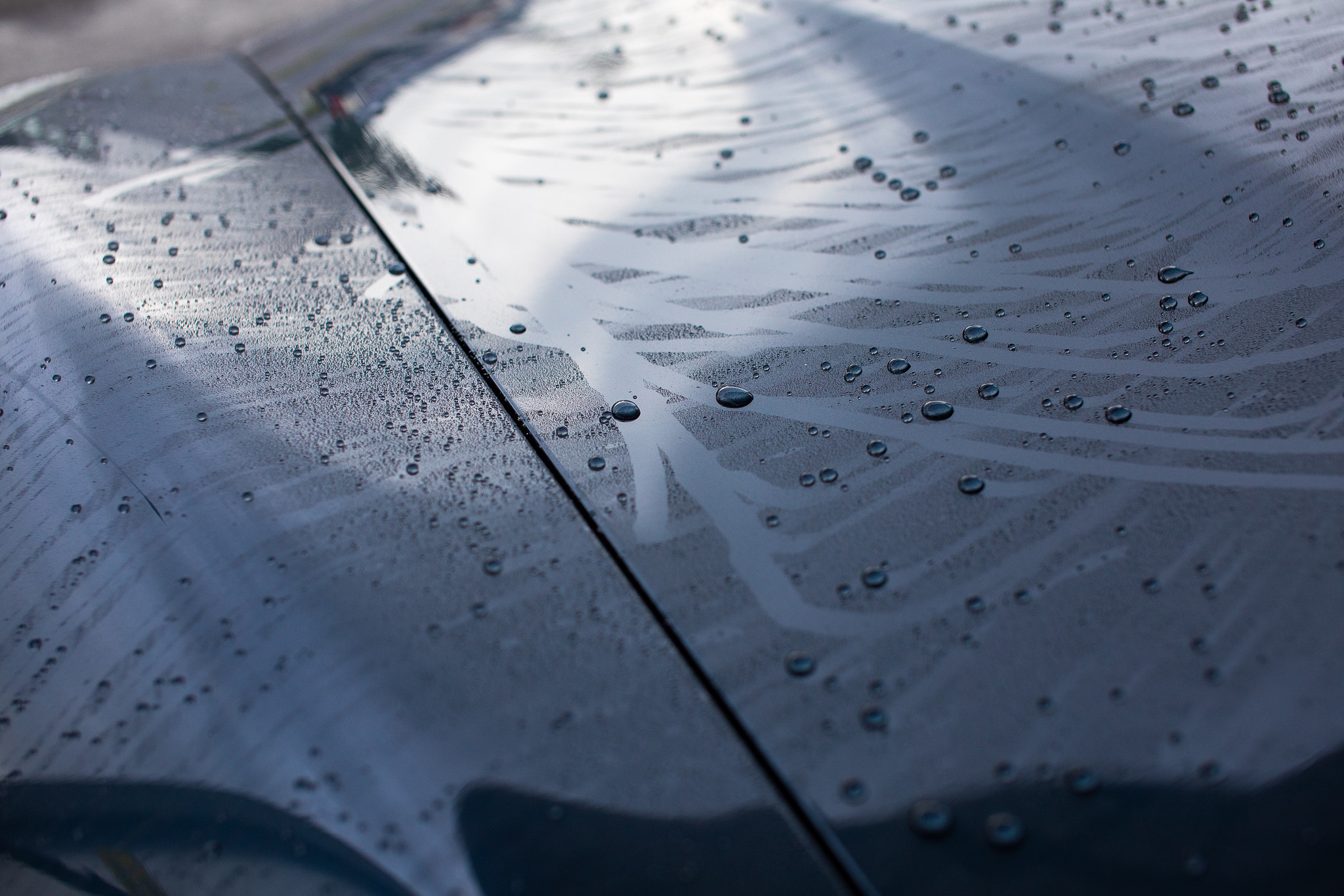 Car hood protected with car ceramic coating by gogonano