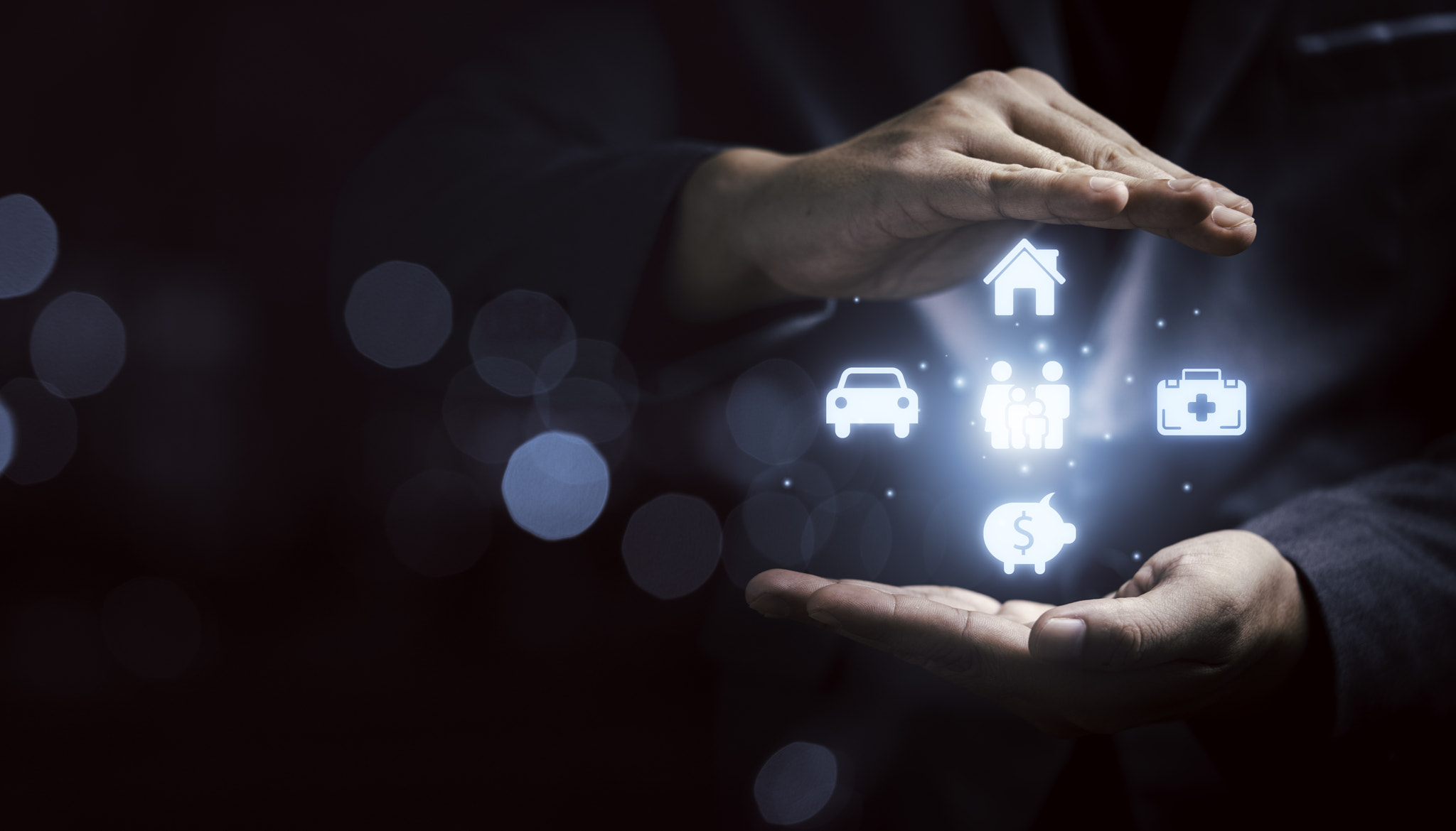 Businessman protecting insurance and assurance icon including family health real estate car and fina