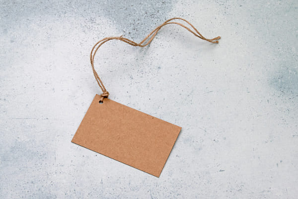 Brown paper label on string by Bryony van der Merwe | 500px