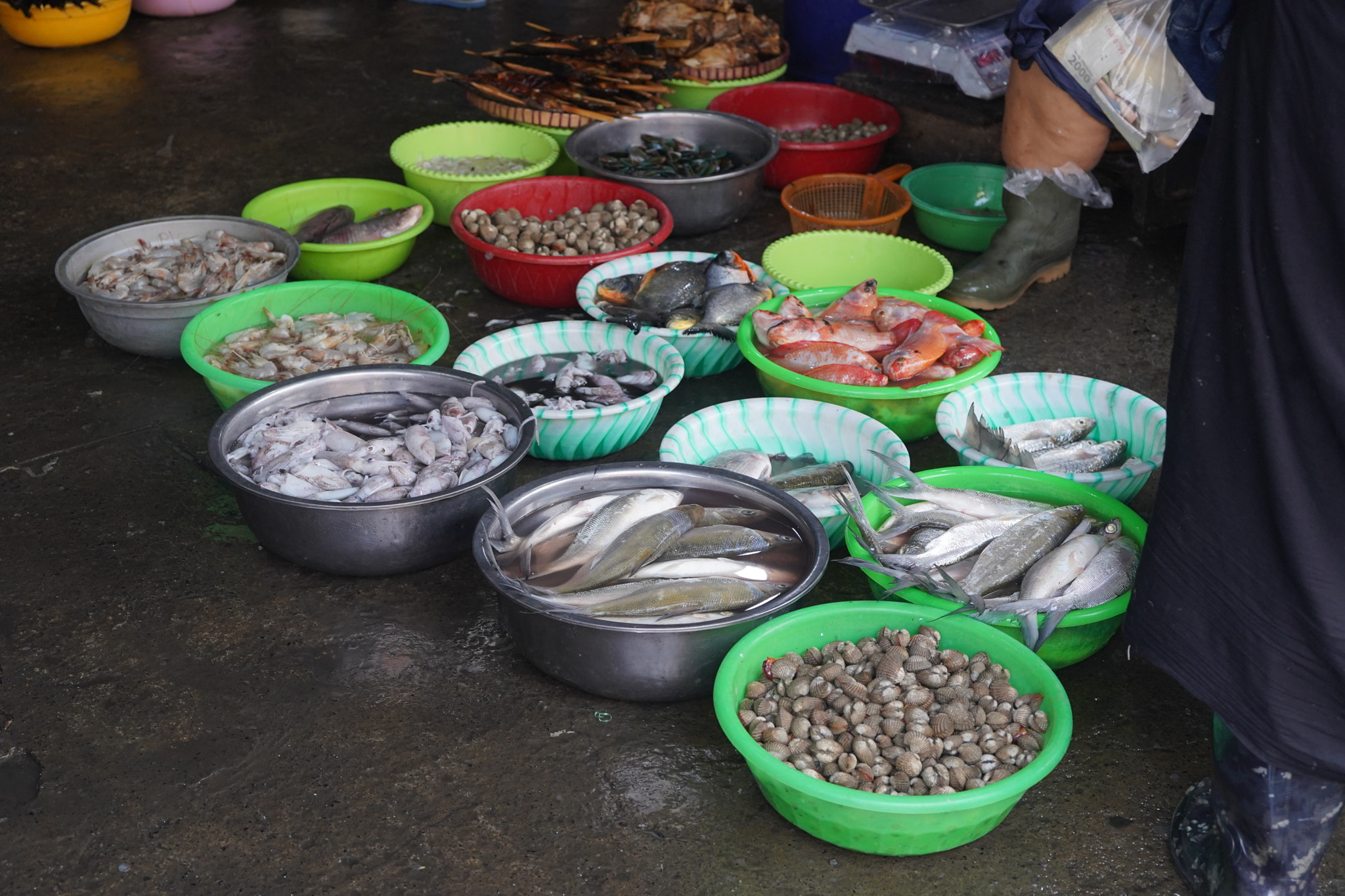 Raw seafoods sold in the traditional market in Ungaran, Semarang, Indonesia.