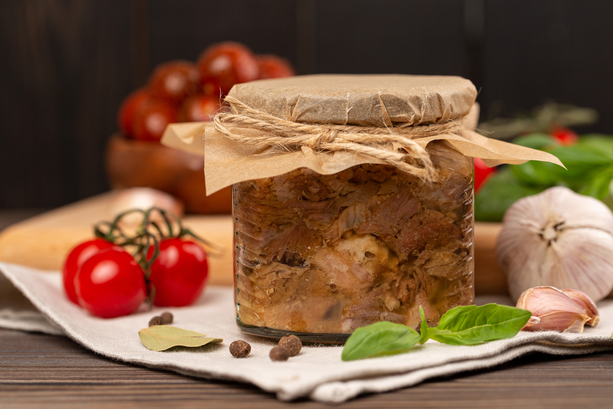 Homemade pork stew in a glass jar, fresh canned, stewed meat