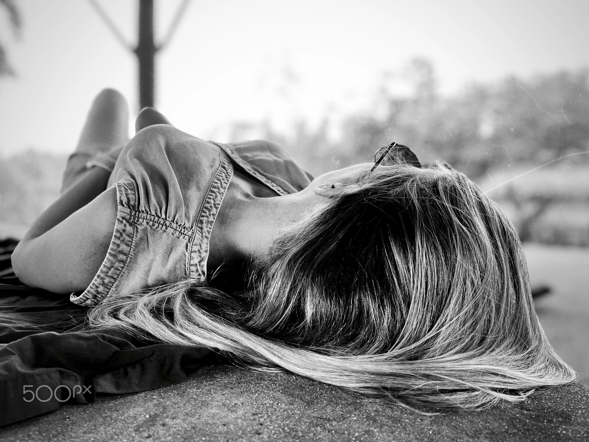 Black and white photography portrait using strong contrast, texture and shallow depth of field