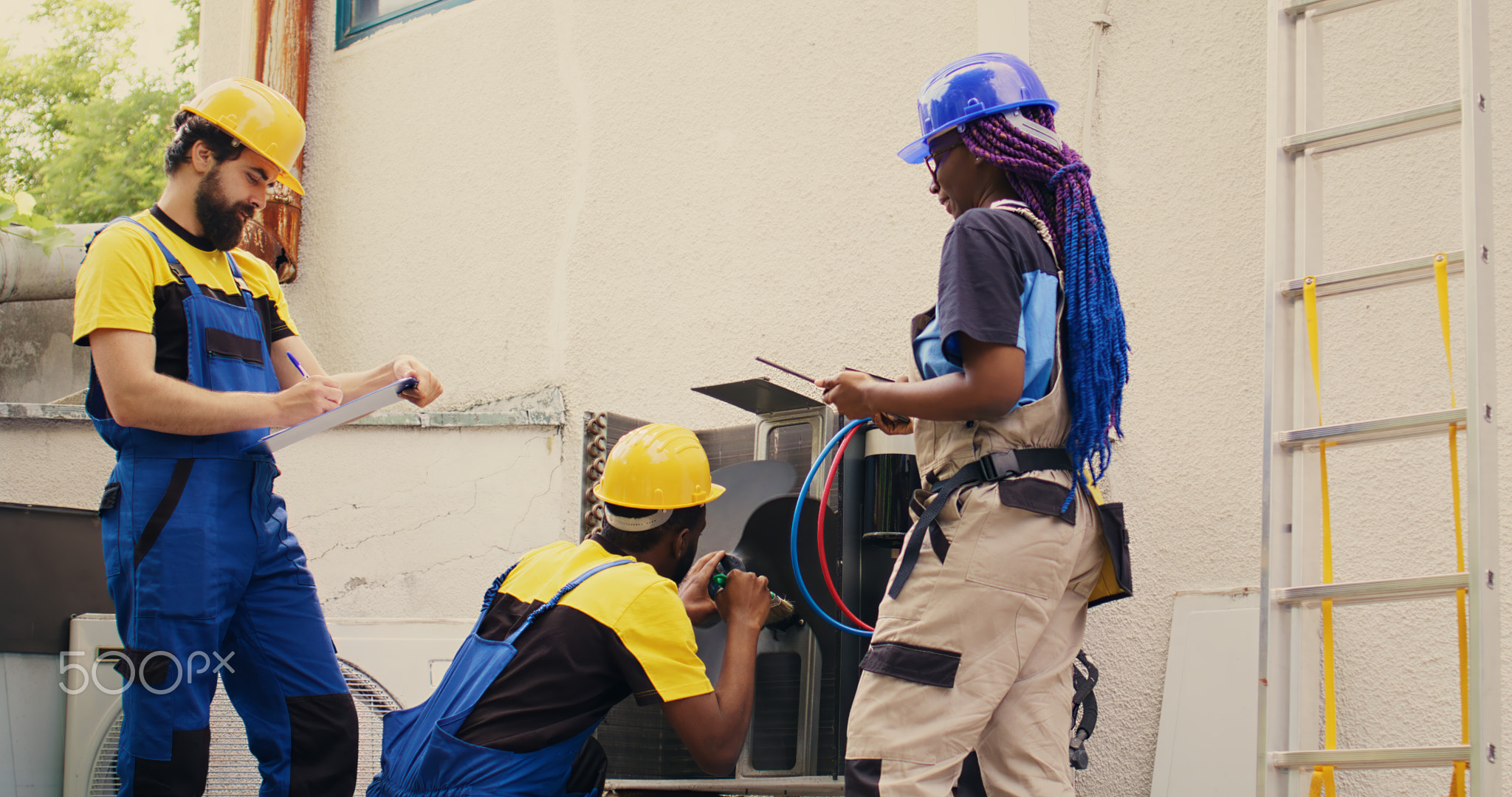 Worker cleaning air conditioner coolants