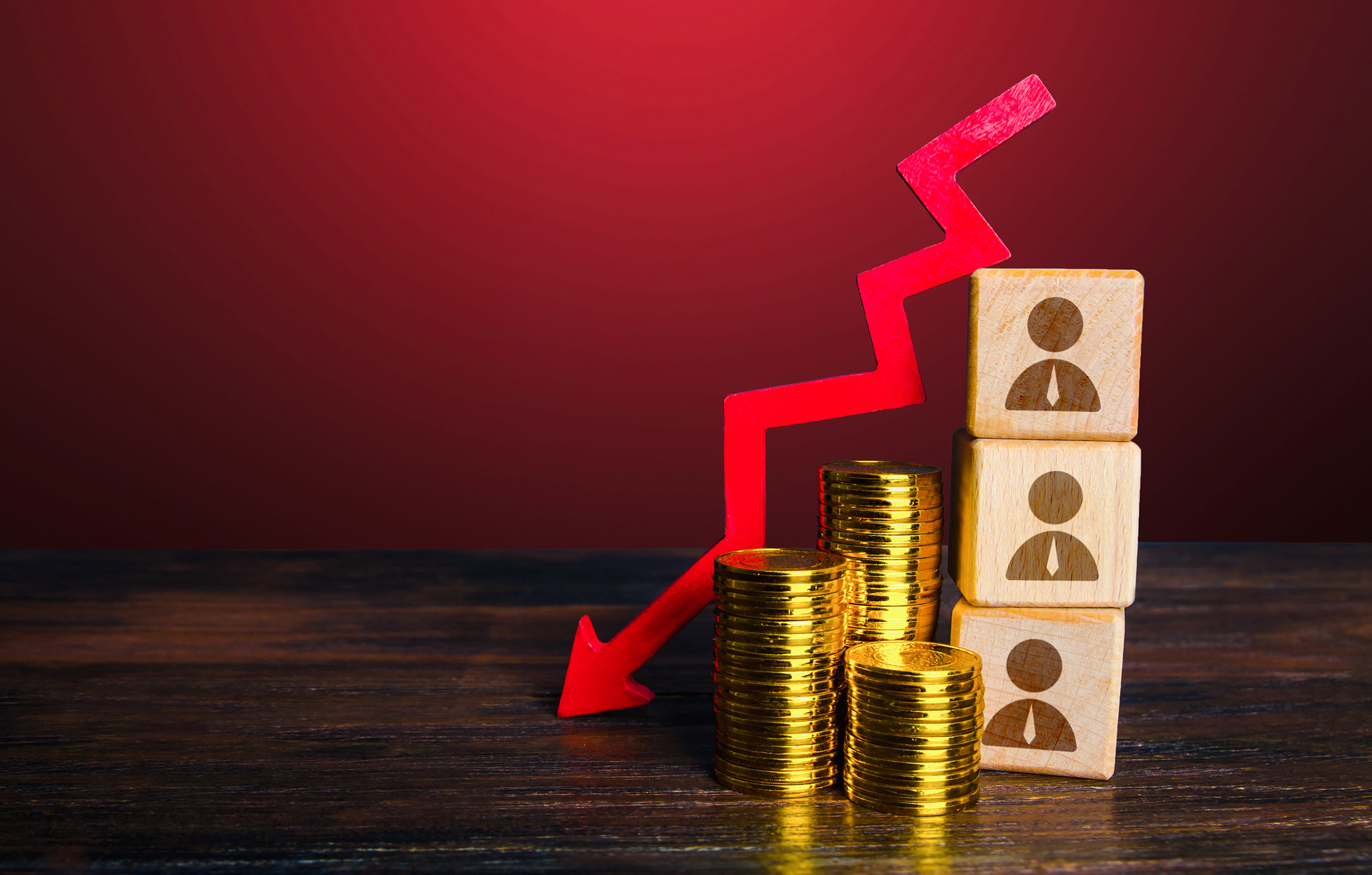 Cost reduction and business optimization. Layoffs and staff downsizing. Falling salaries of employee