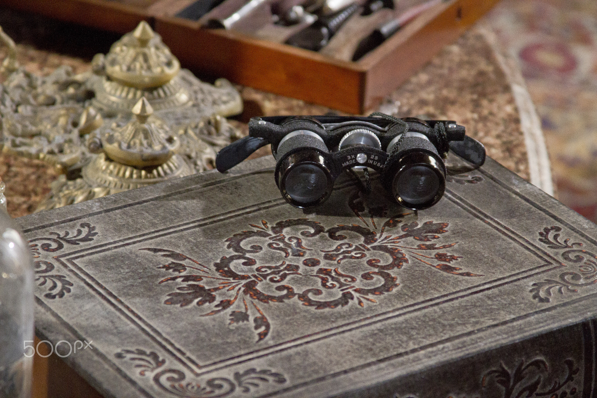 Antique book and medical equipment.