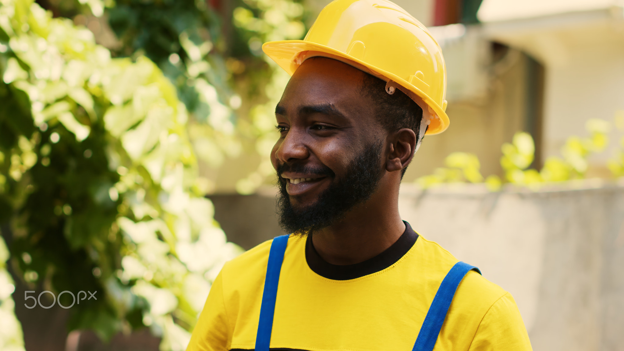 Smiling repairman using manometer