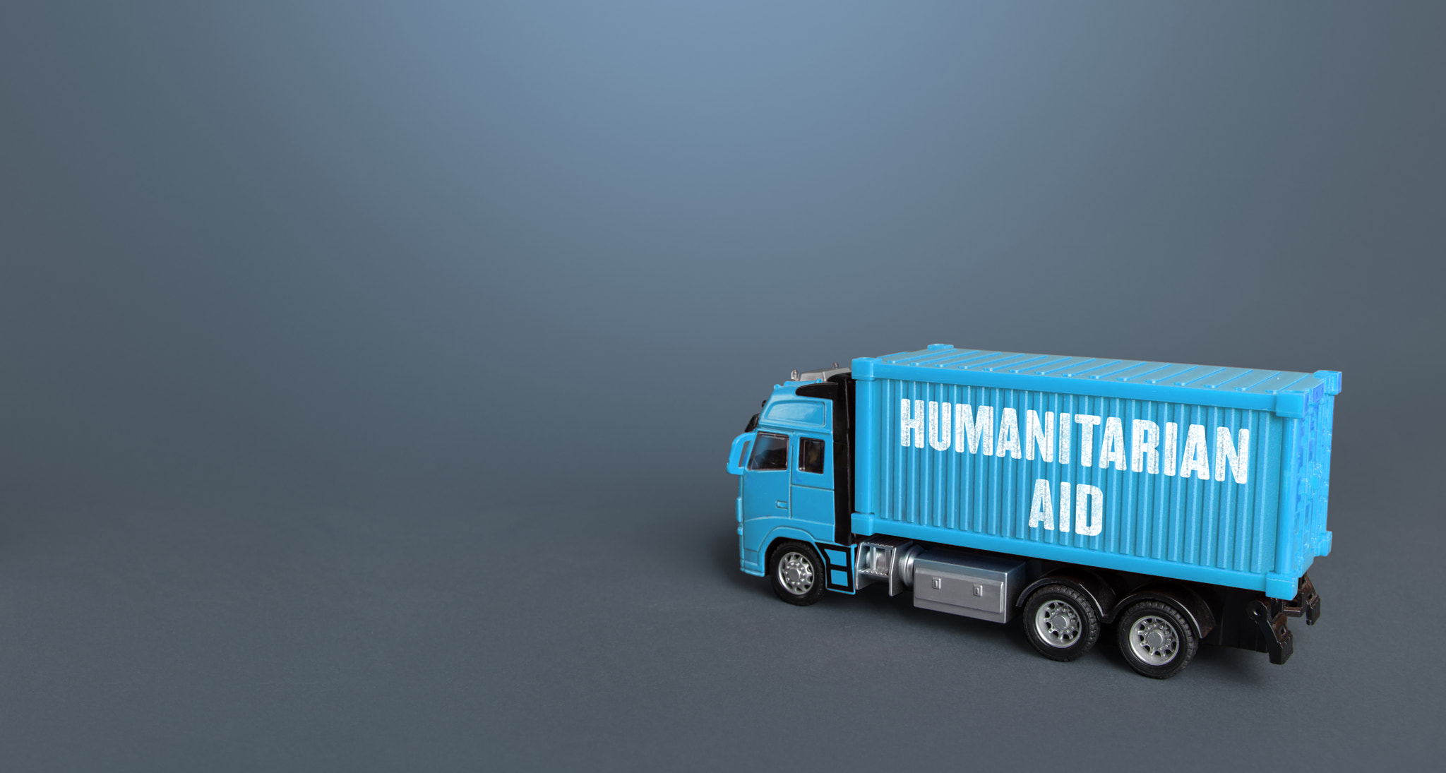 A truck with humanitarian aid. Collection and delivery of humanitarian cargo and supplies to the aff