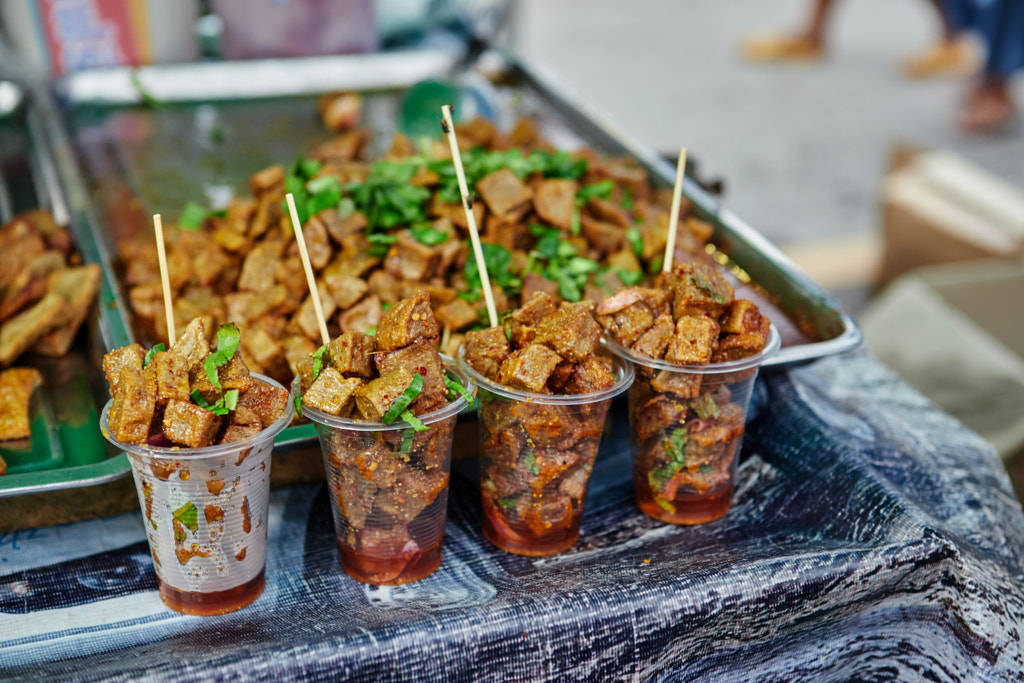 Keropok lekor dipping sauce in plastic cup by Anucha Muphasa on 500px.com