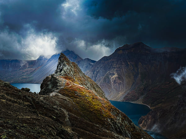 Vibrant Mountain Landscape with Turquoise Lake Evoking Serenity