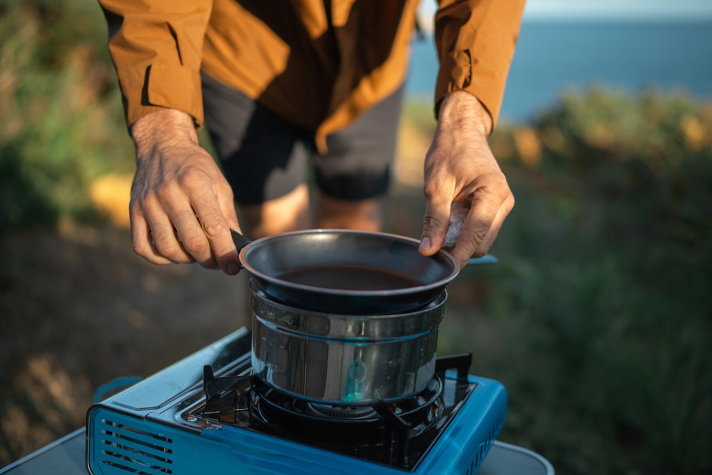 Senior man cooking food by Olha Dobosh on 500px.com