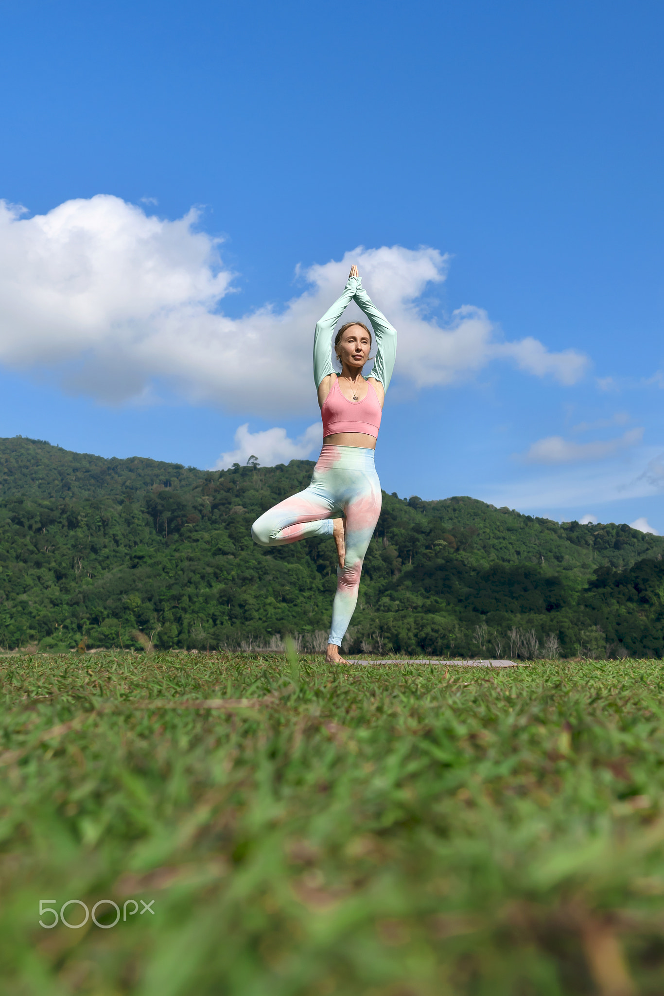 vibrant portrait of a girl doing morning workout and stretching