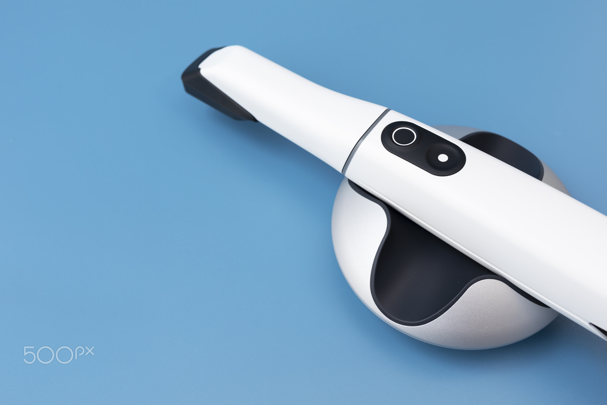 White 3d Intraoral Dental Tooth Scanner On Blue Background. Dental
