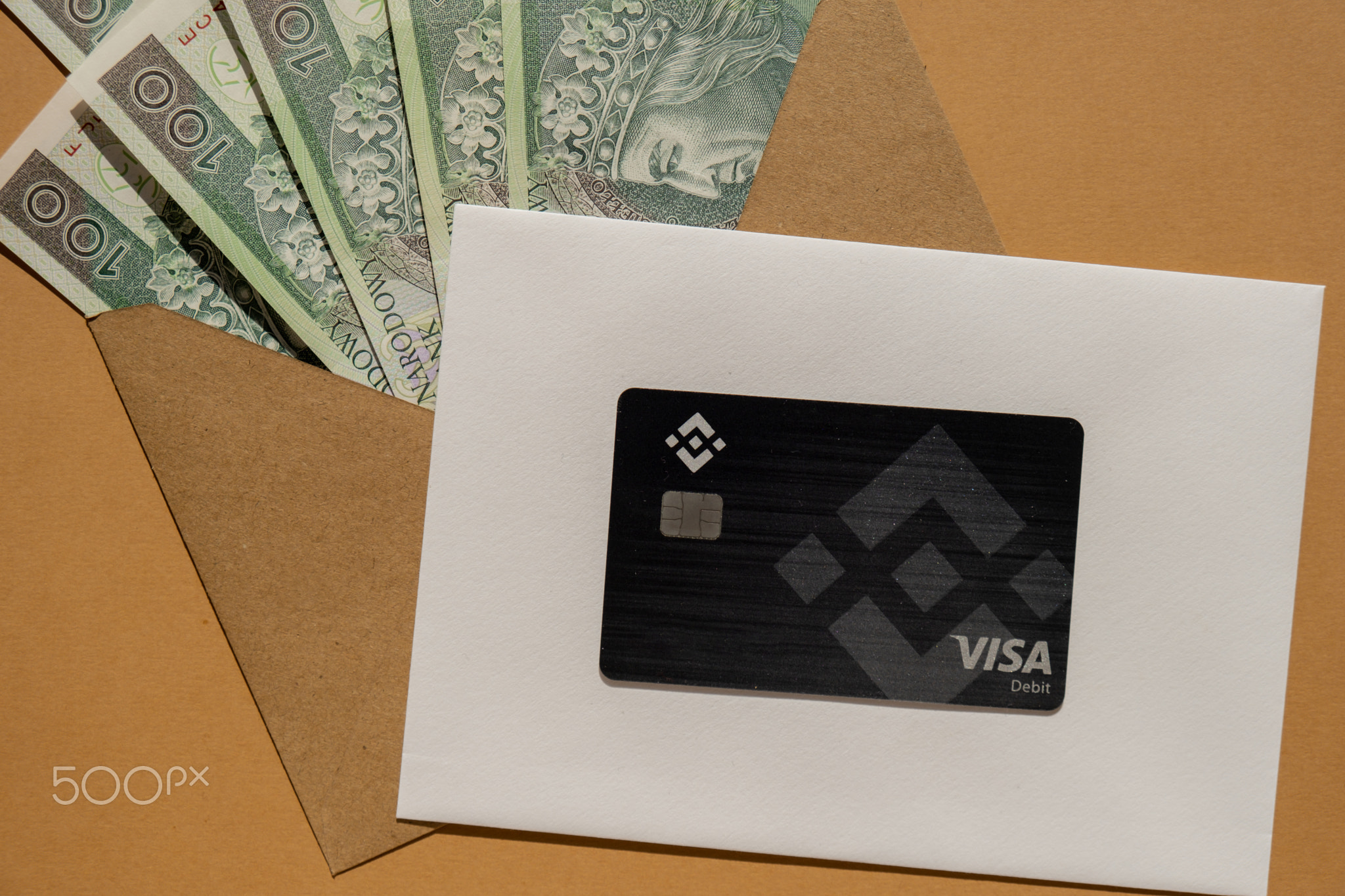 Gdansk Poland - 20 June 2022: Black Binance Coin Card with polish