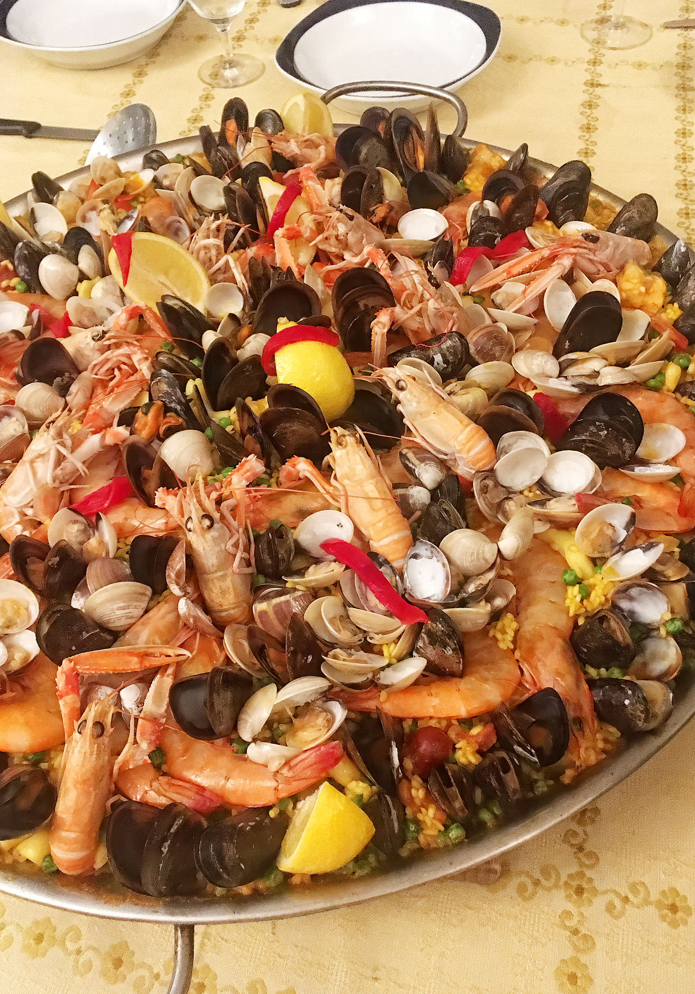Top view from above on seafood paella on table