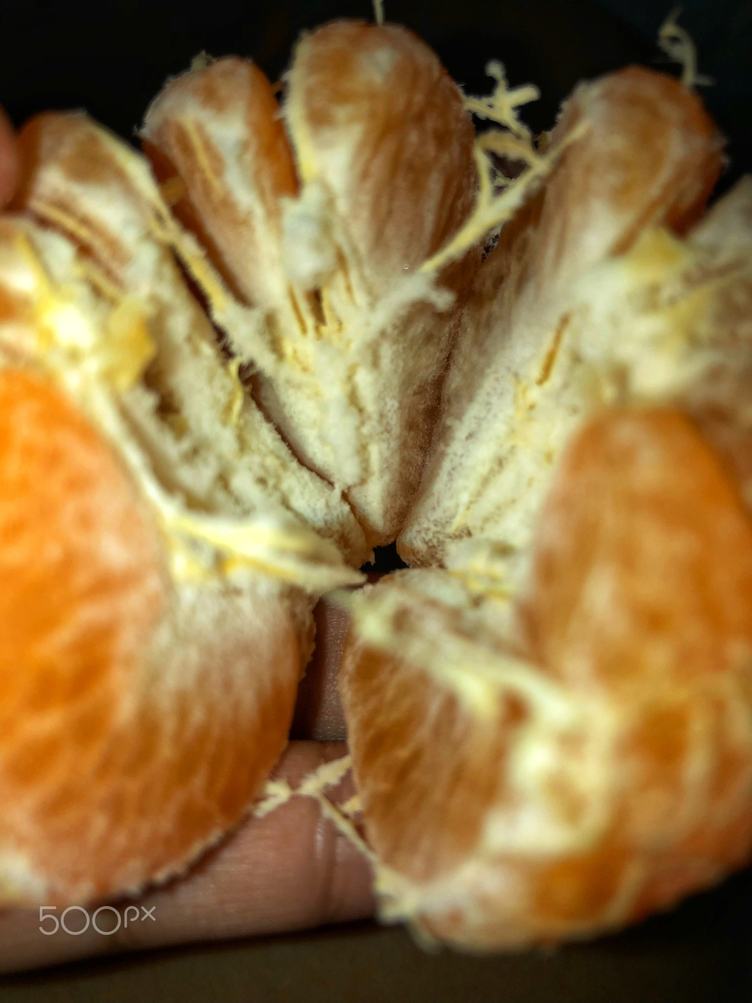 Peeled orange fruit