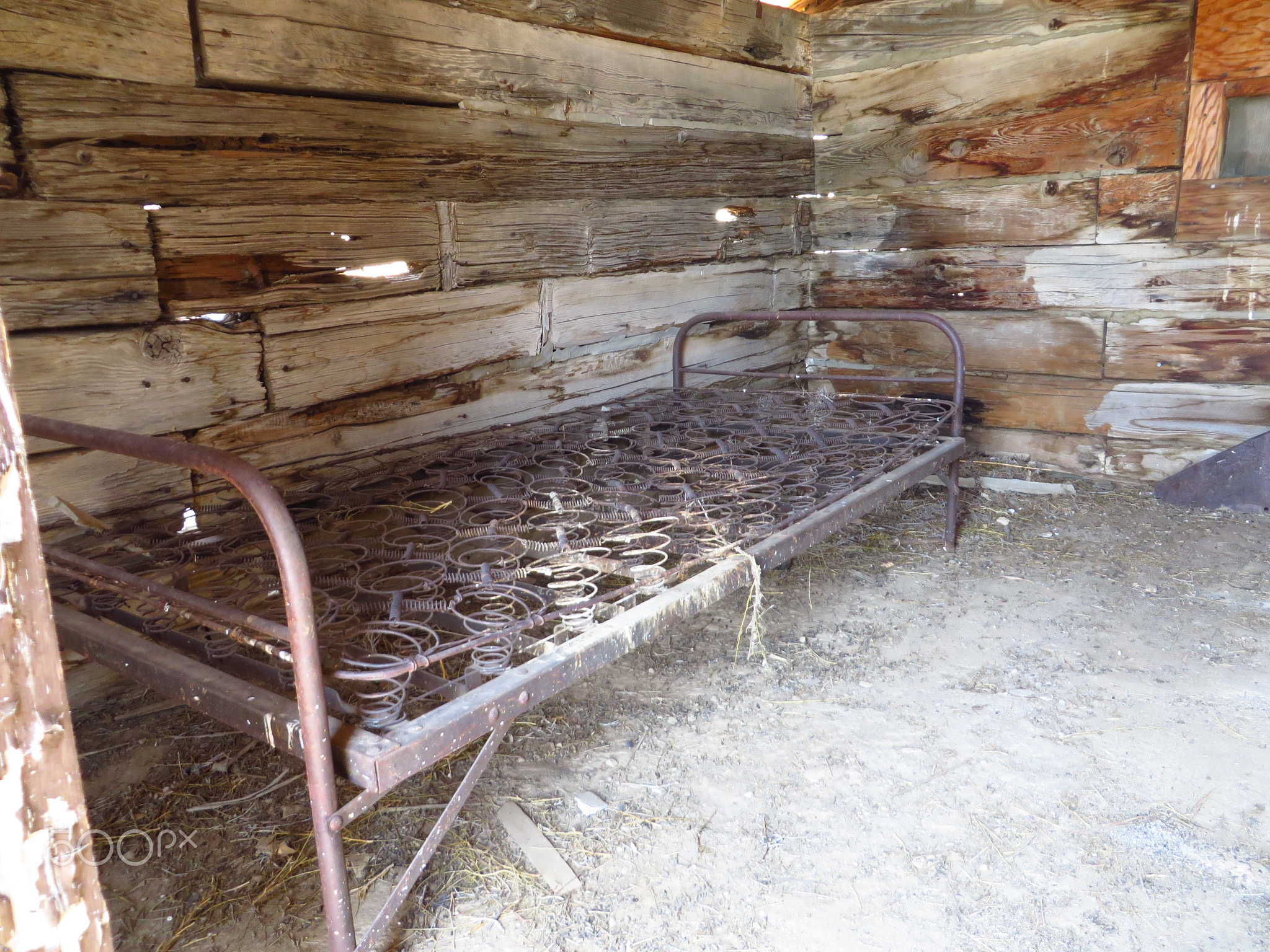 Abandoned Metal Bed Frame with Springs in Miner's Cabin, Death Valley