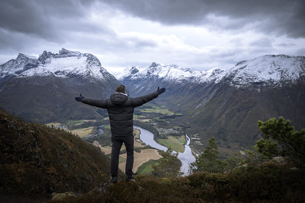 Traveler enjoying a mountain landscape in the Norwegian fjords by Jesús FCS on 500px.com