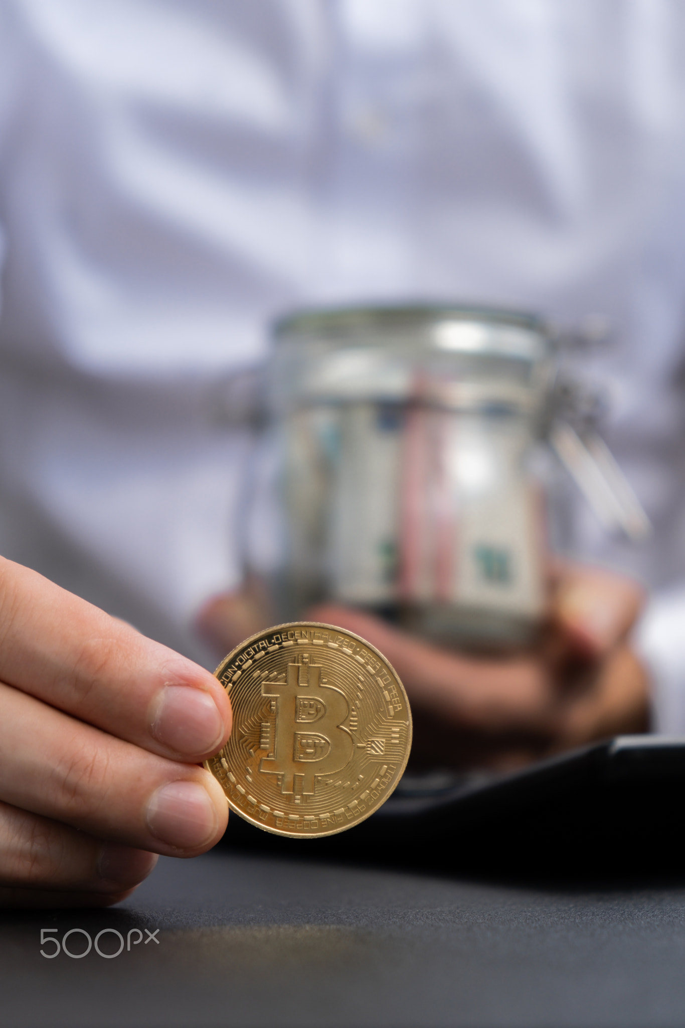 Expert trader hands showing Bitcoin coin digital gold after counting